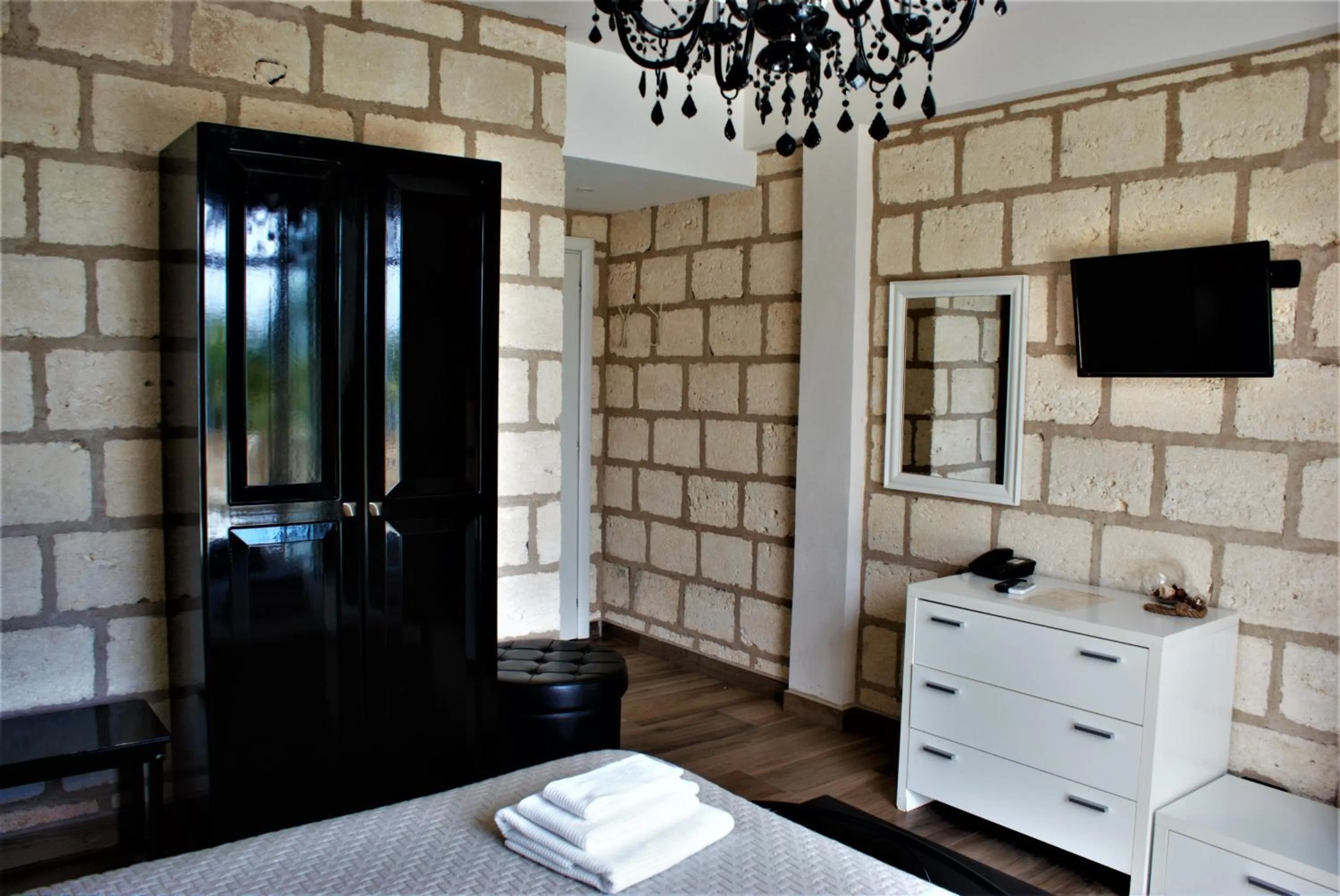 Bedroom in CapoSperone Resort