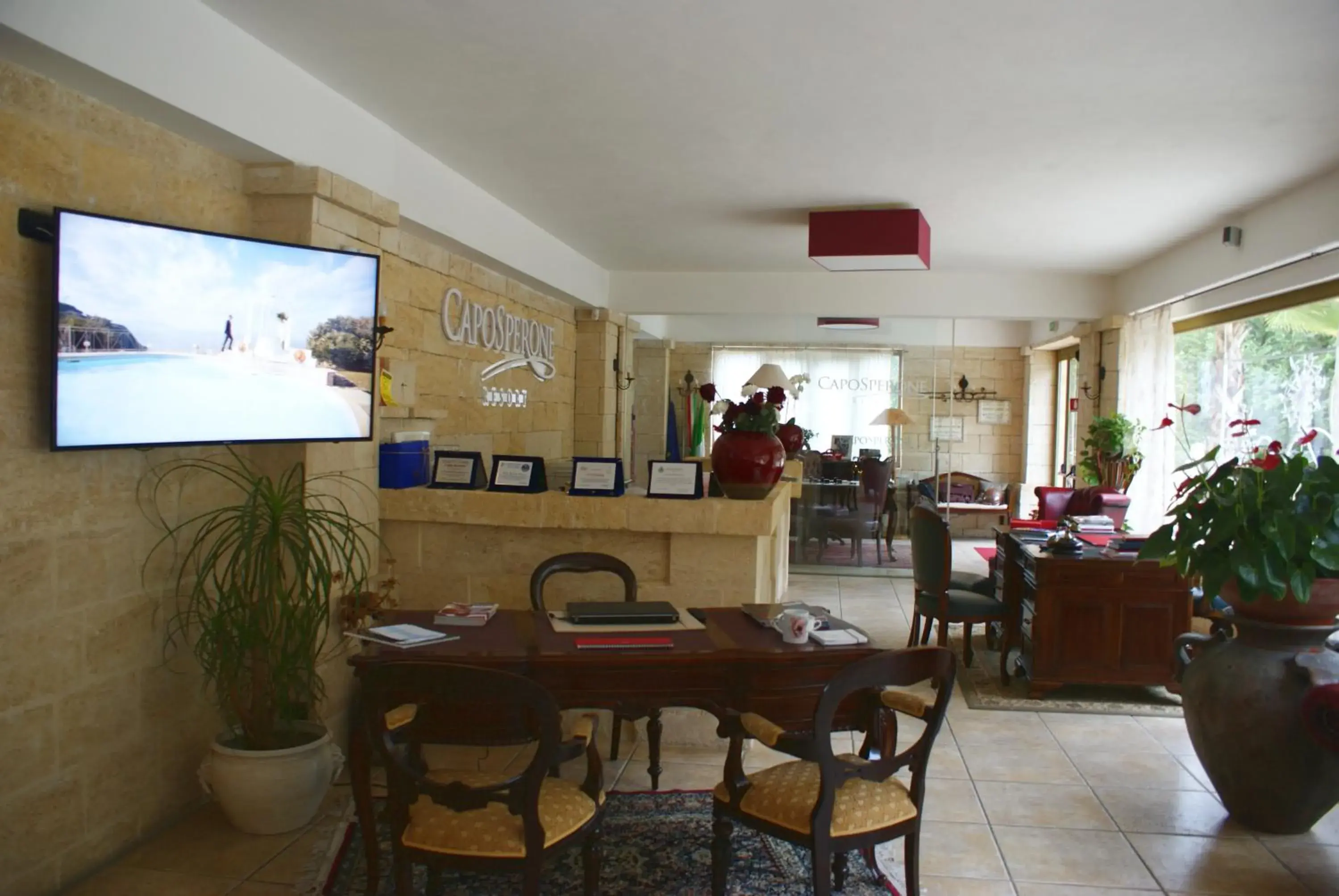 Lobby or reception in CapoSperone Resort Lobby or reception in CapoSperone Resort