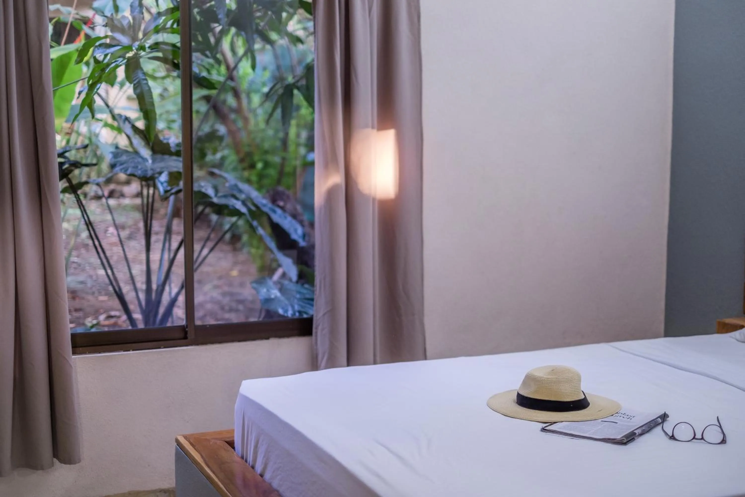 Bed in Zula Inn Aparthotel