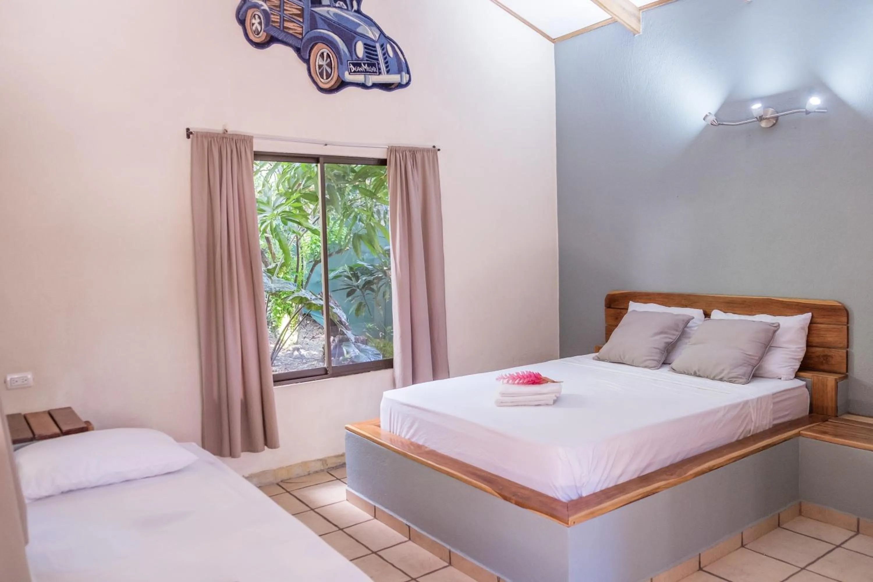 Bed in Zula Inn Aparthotel