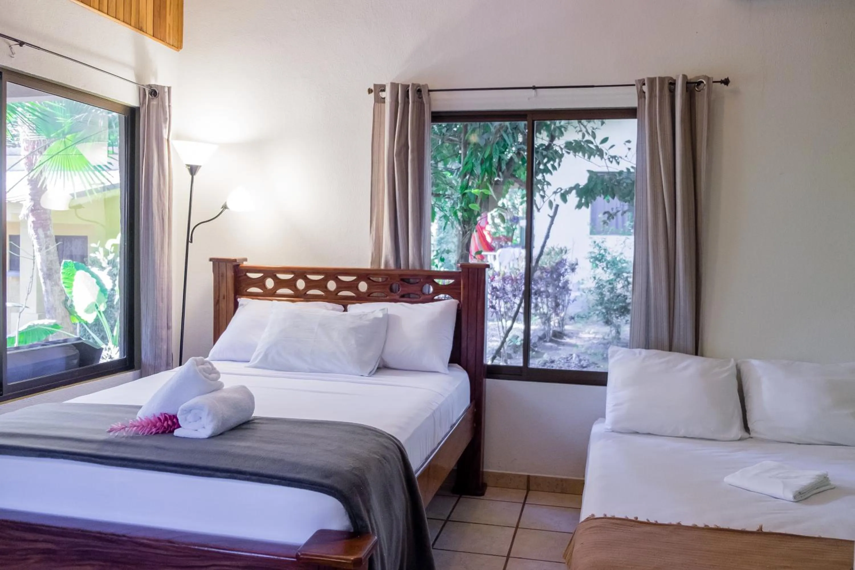 Bed in Zula Inn Aparthotel