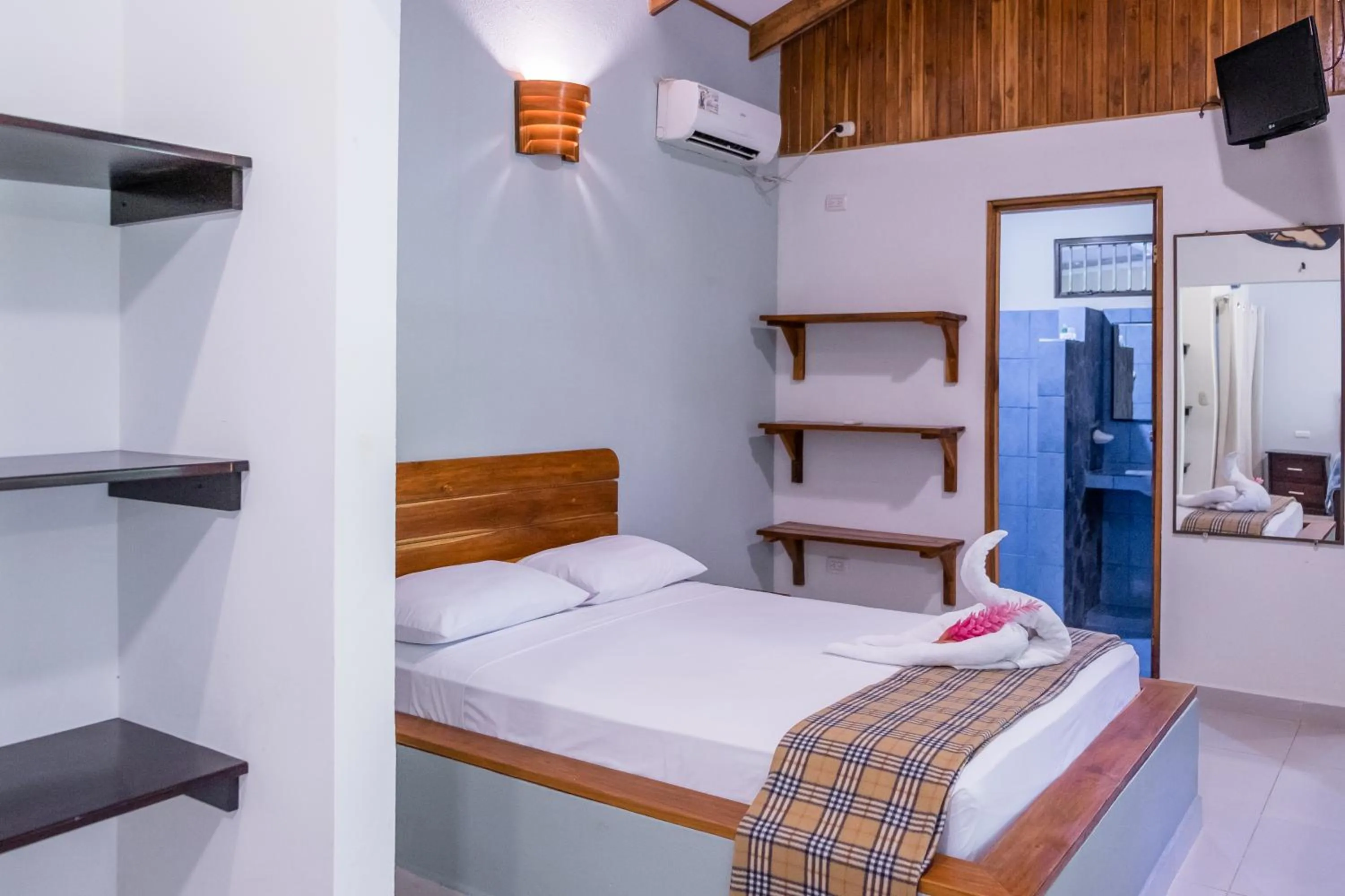 Bed in Zula Inn Aparthotel