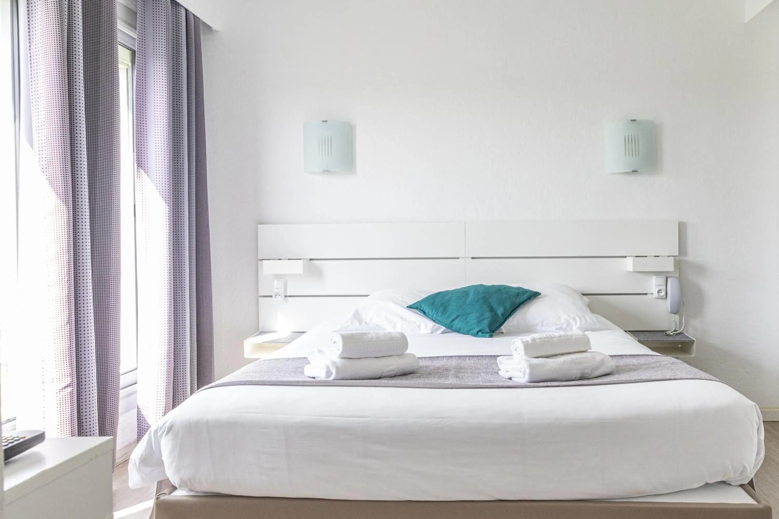 Bed in Hotel Aquarius