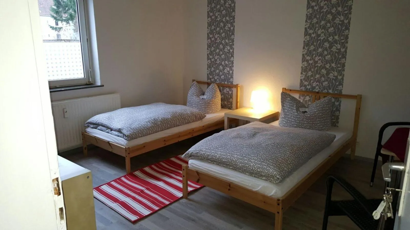 Bed in Ferienwohnungen by K Krause