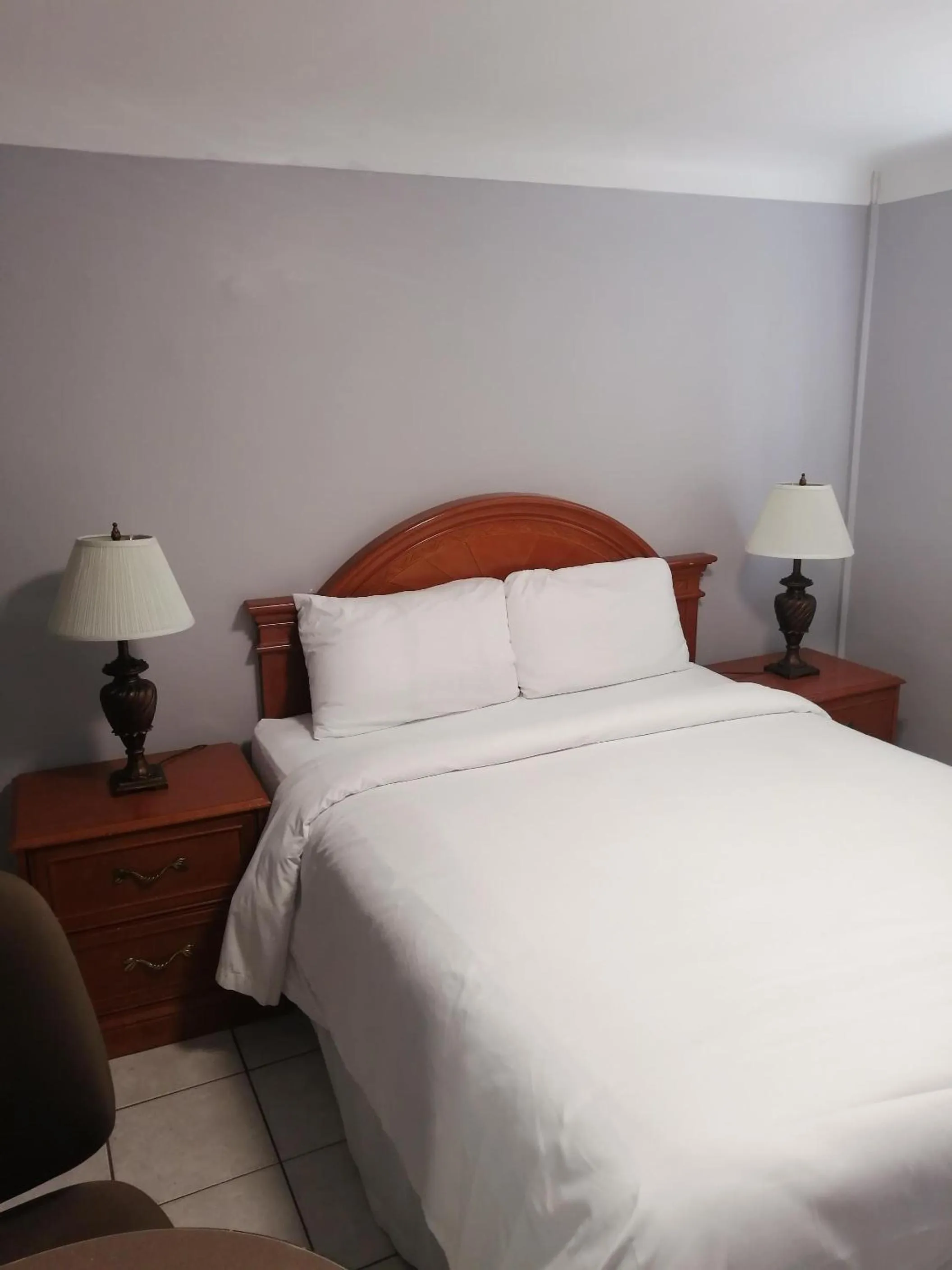 Bed in iCheck Inn Motel