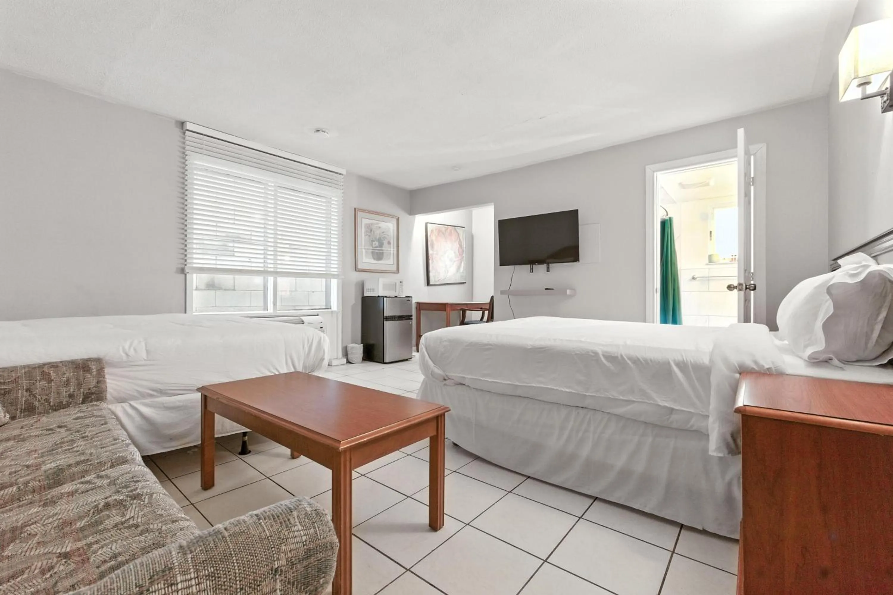 Bed in iCheck Inn Motel