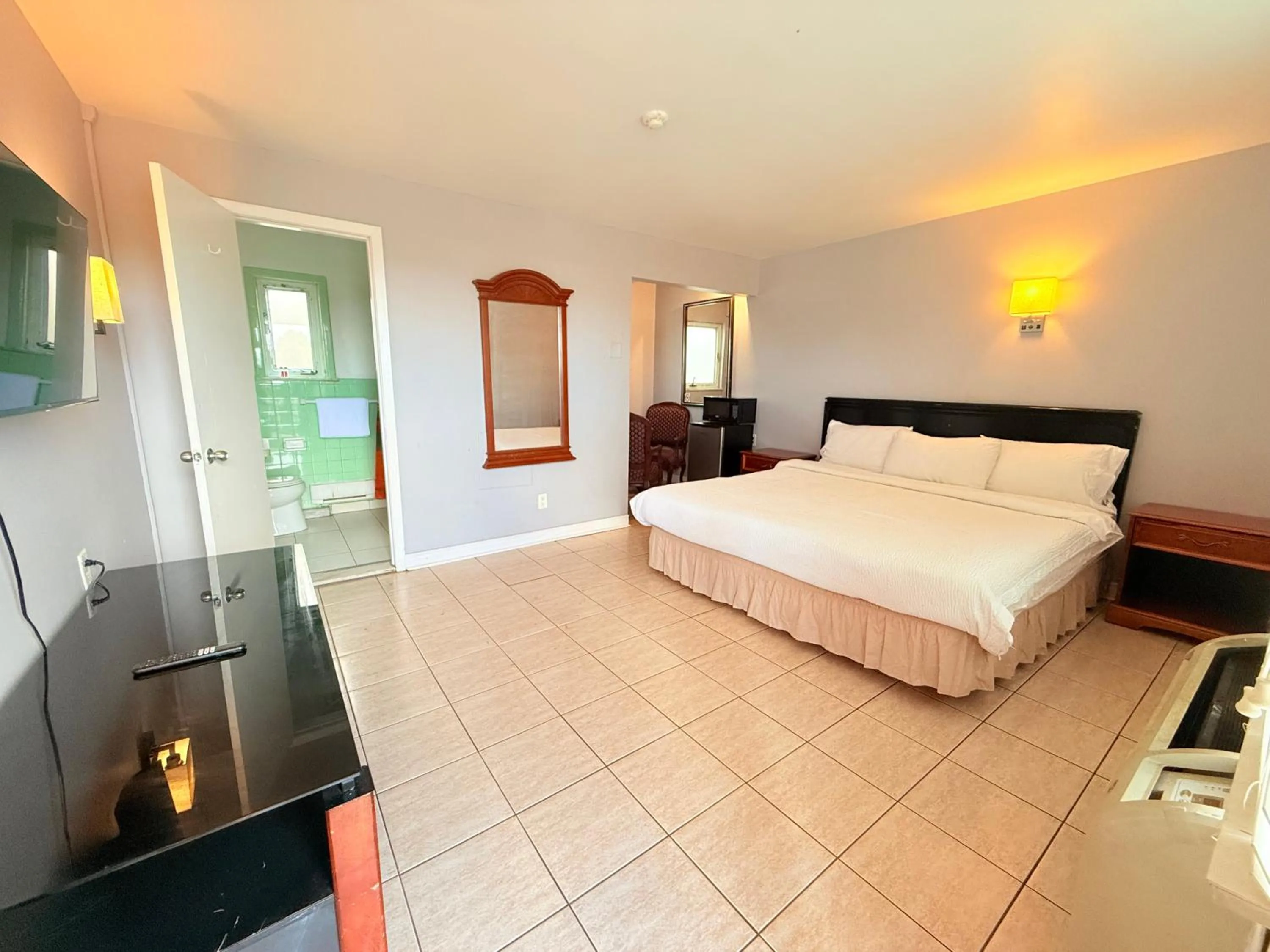 Bed in iCheck Inn Motel