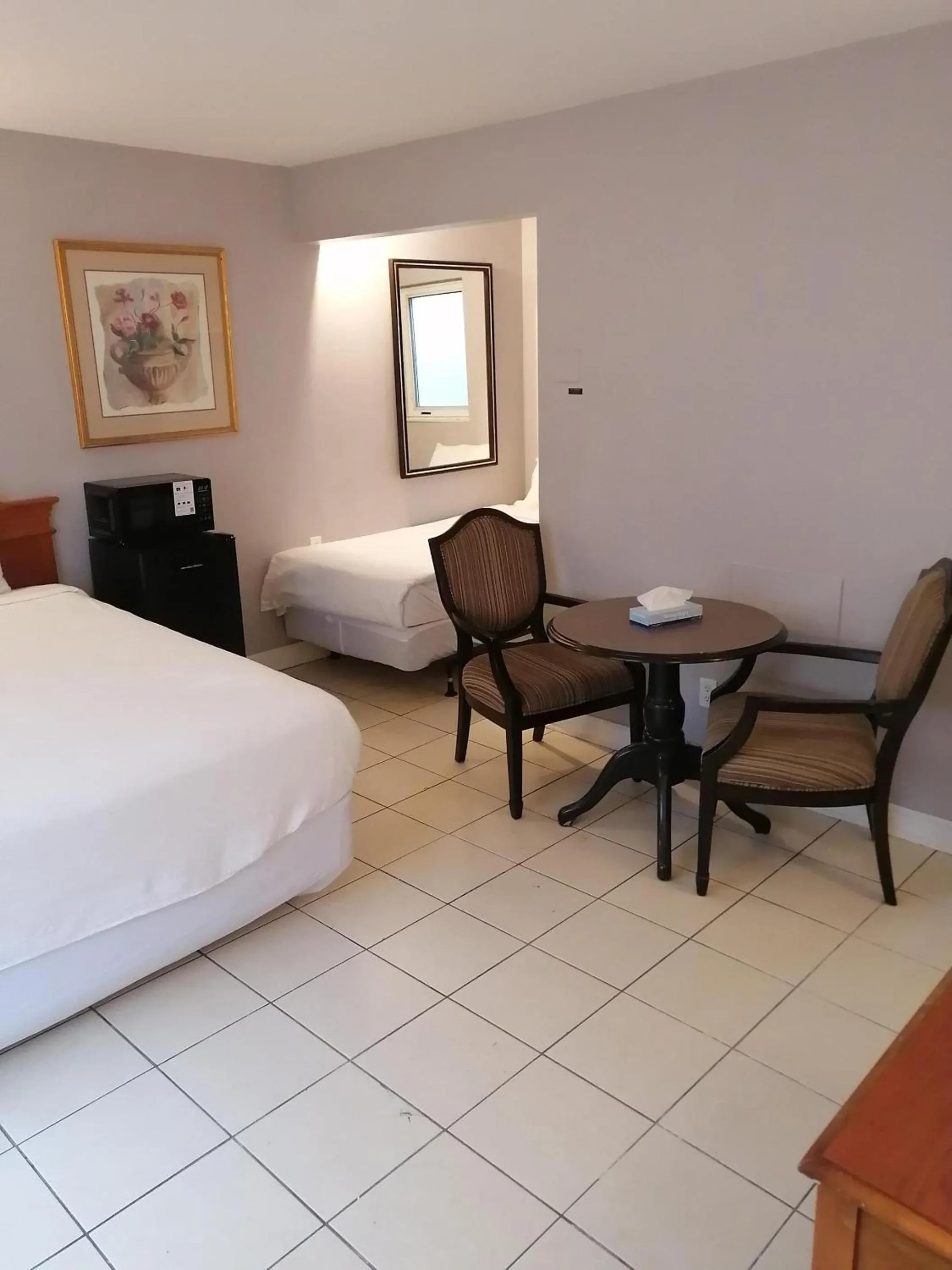 Bed in iCheck Inn Motel