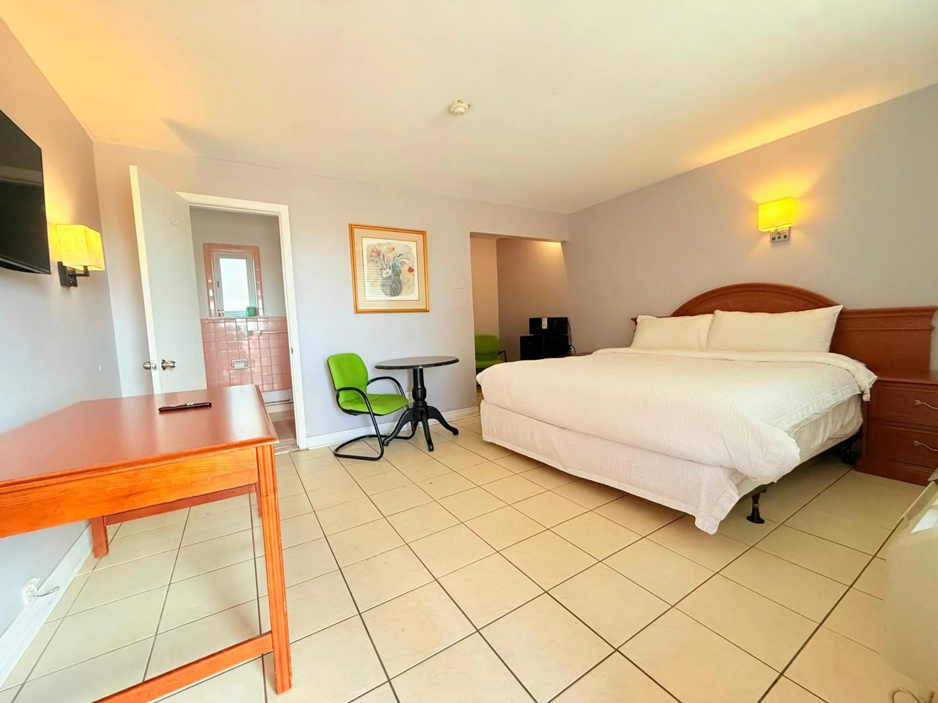 Bed in iCheck Inn Motel