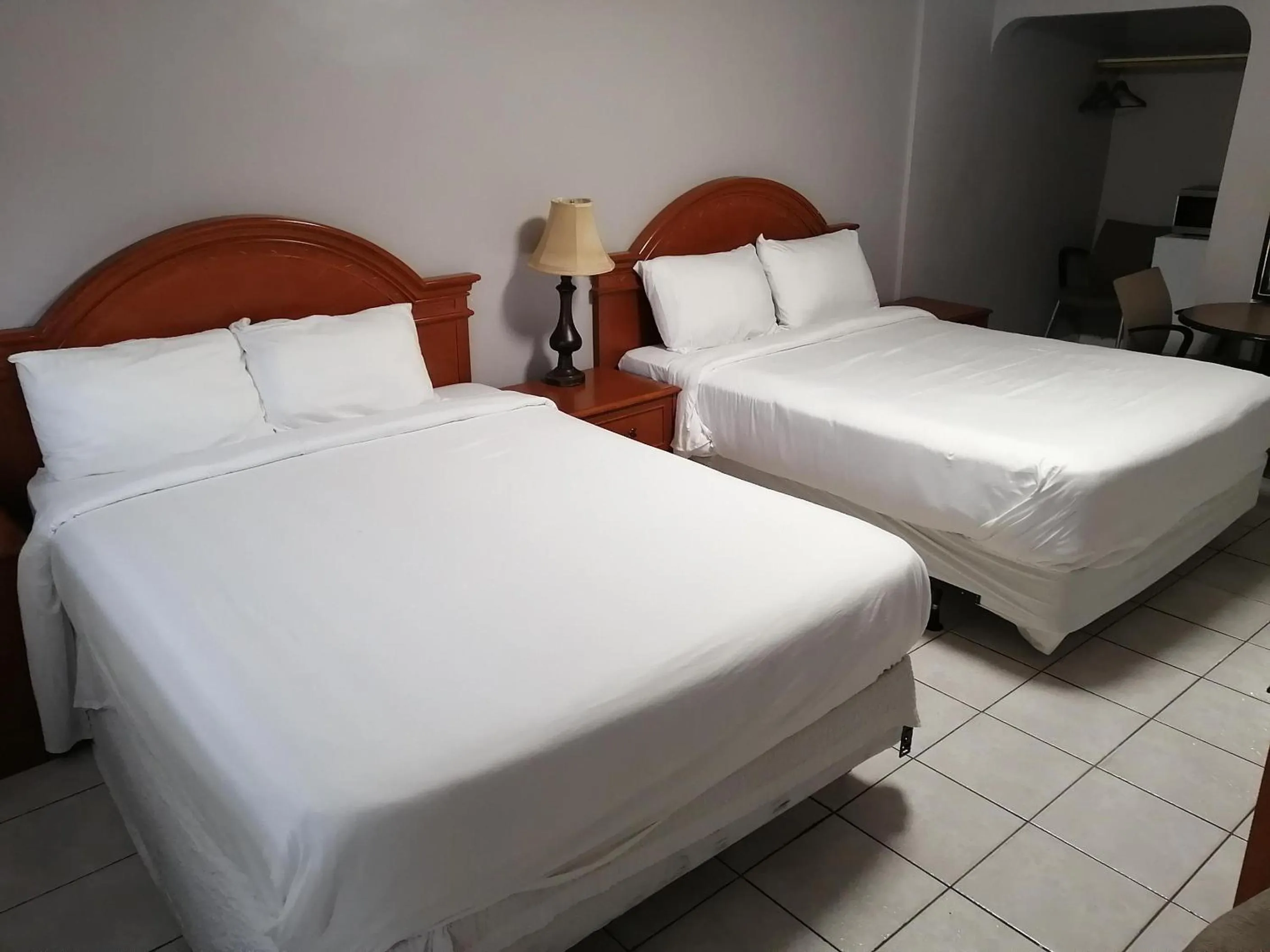 Bed in iCheck Inn Motel