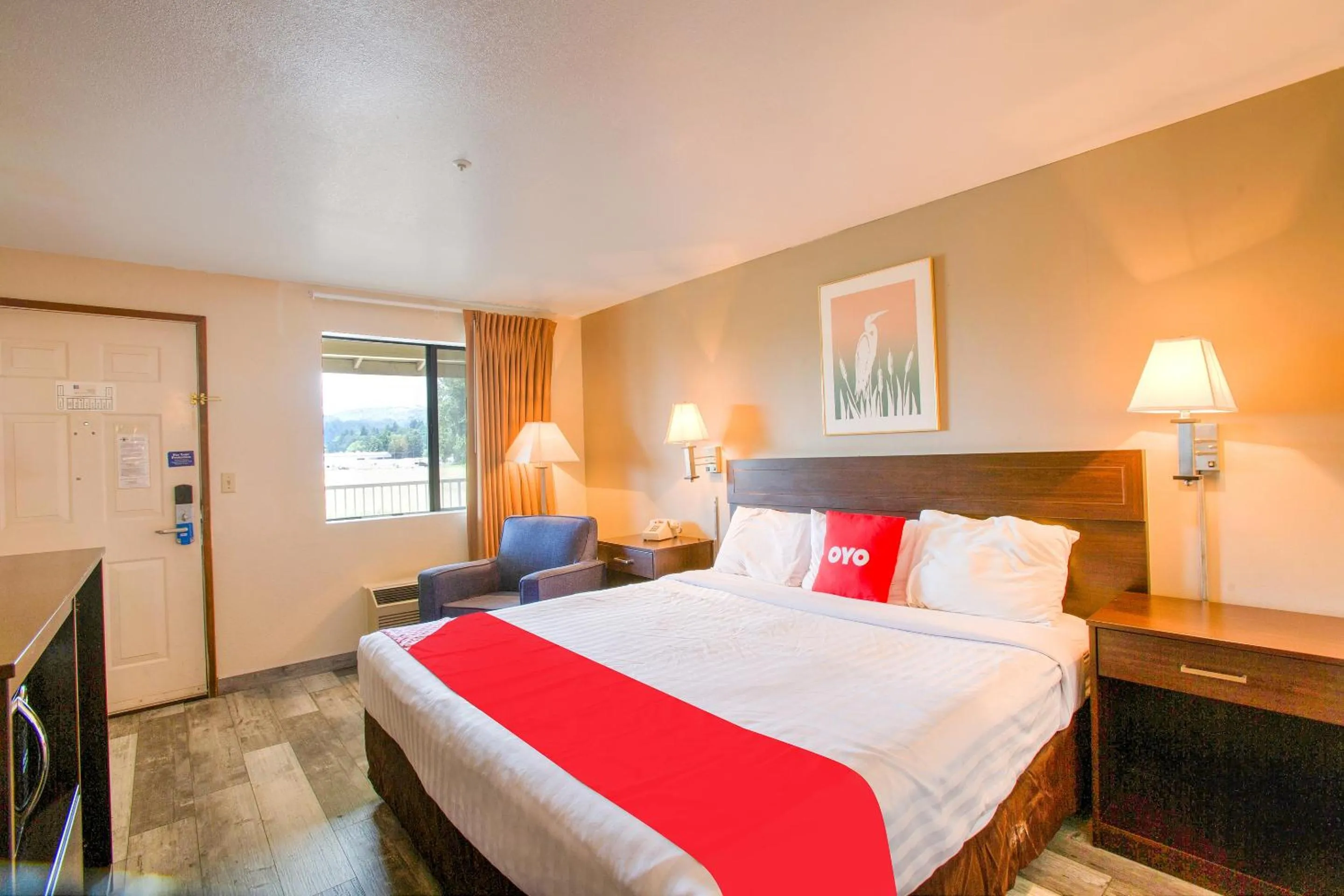 Bedroom, Bed in OYO Woodland Hotel and Suites