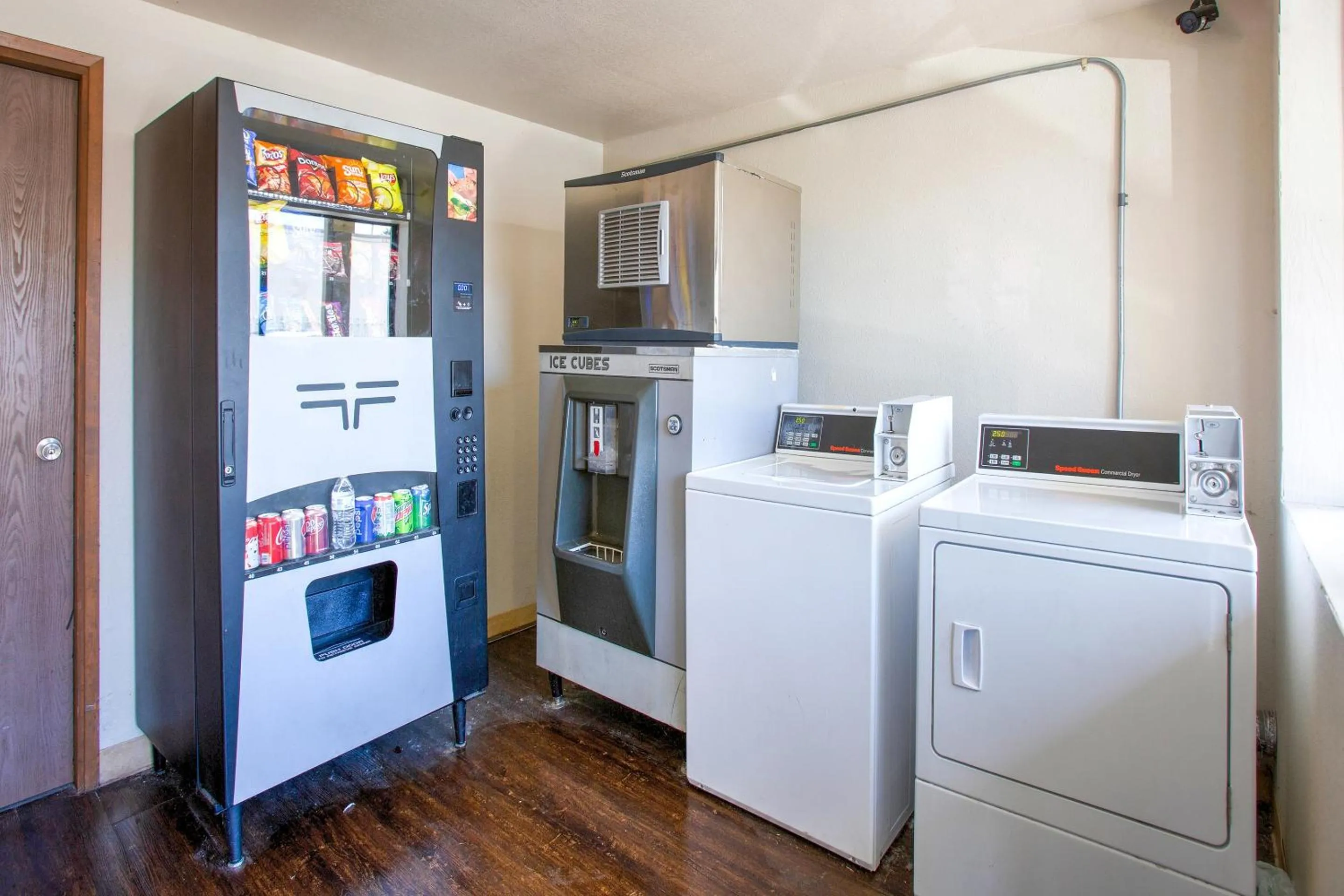 Kitchen or kitchenette in OYO Woodland Hotel and Suites