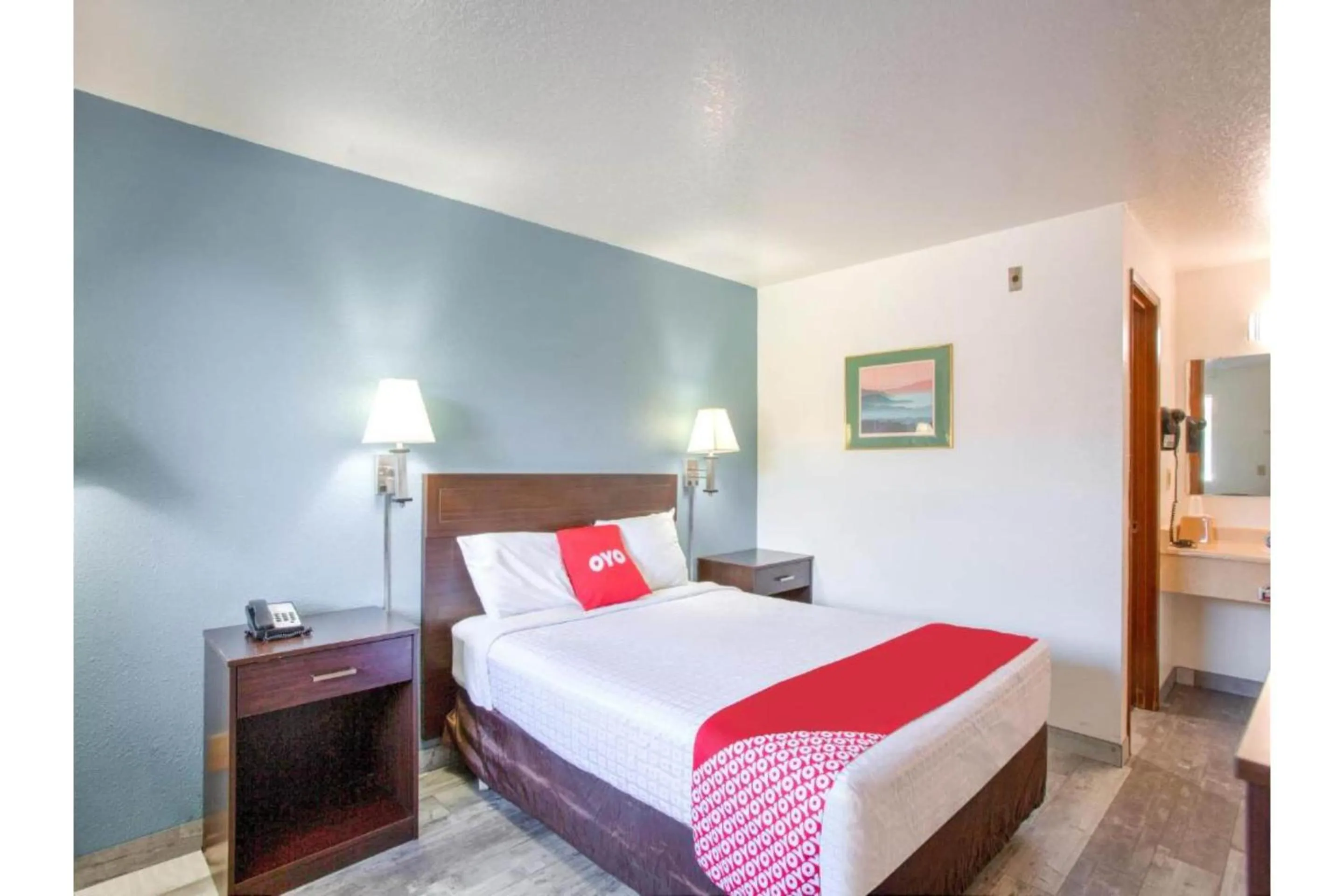 Bedroom, Bed in OYO Woodland Hotel and Suites