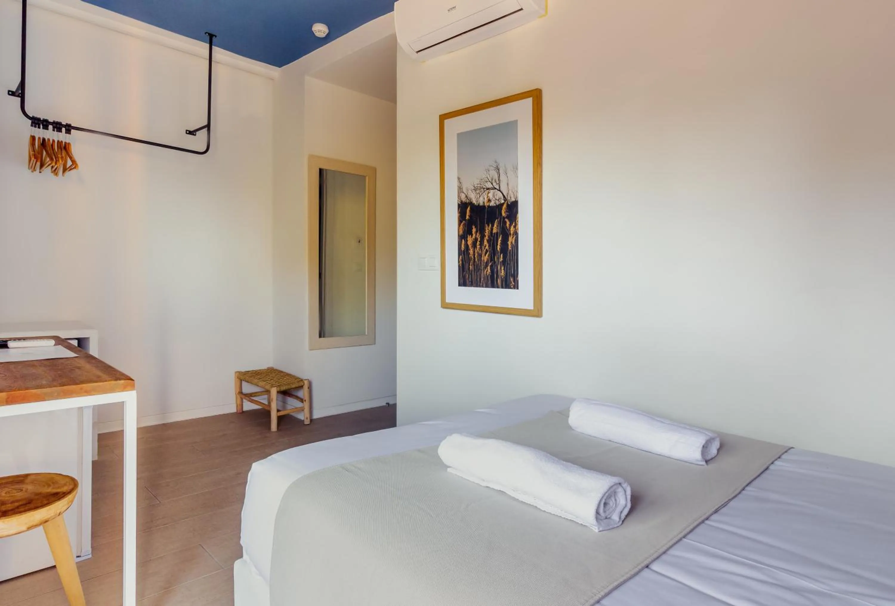 Photo of the whole room, Bed in YOU & CO. Saler Beach Boutique