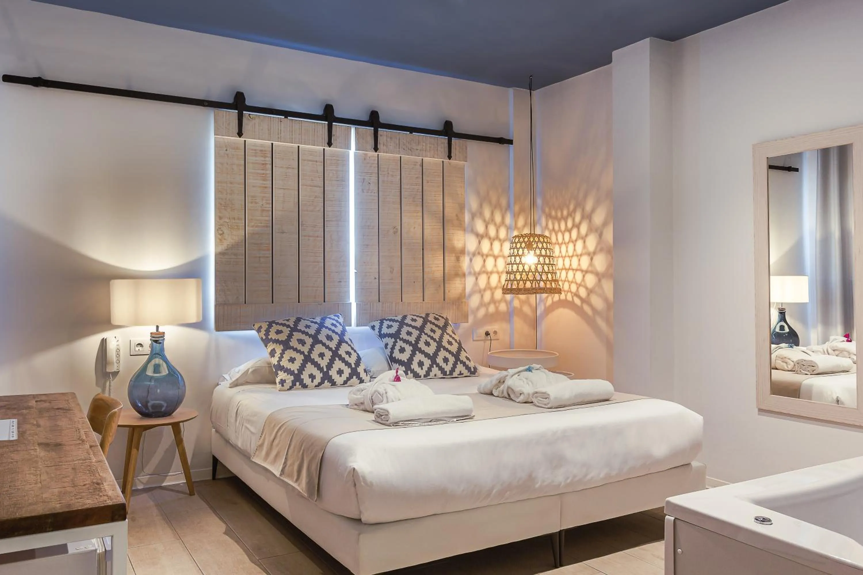 Photo of the whole room, Bed in YOU & CO. Saler Beach Boutique