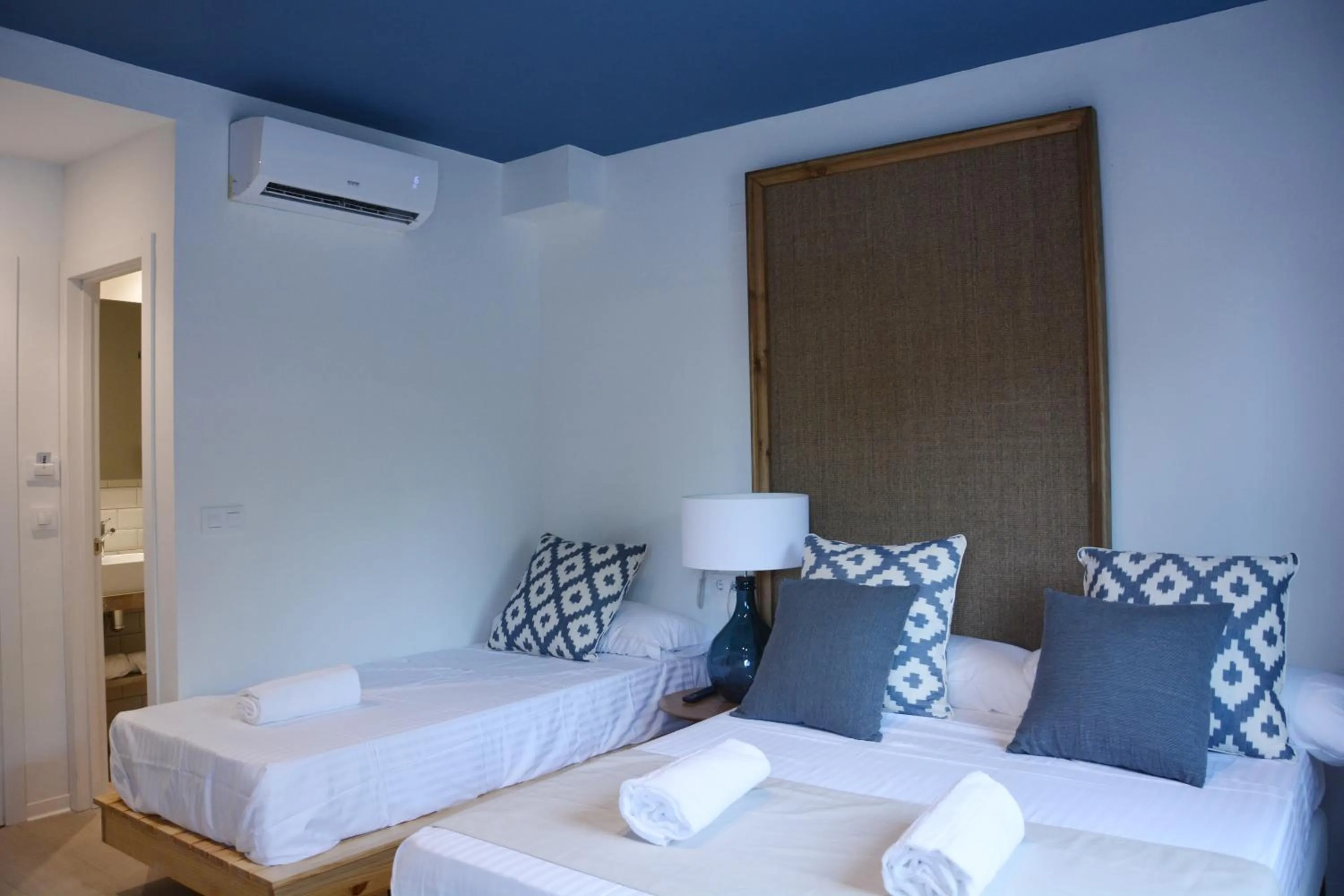 Photo of the whole room, Bed in YOU & CO. Saler Beach Boutique