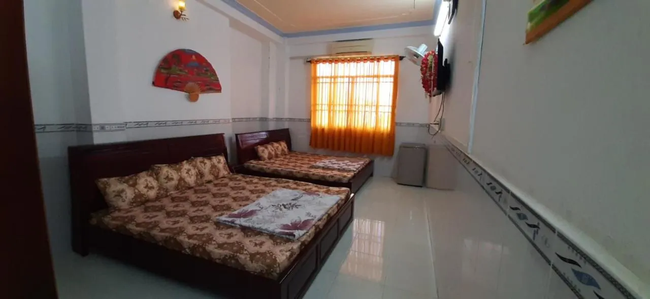 Bed in Huynh Lac Can Tho Hotel