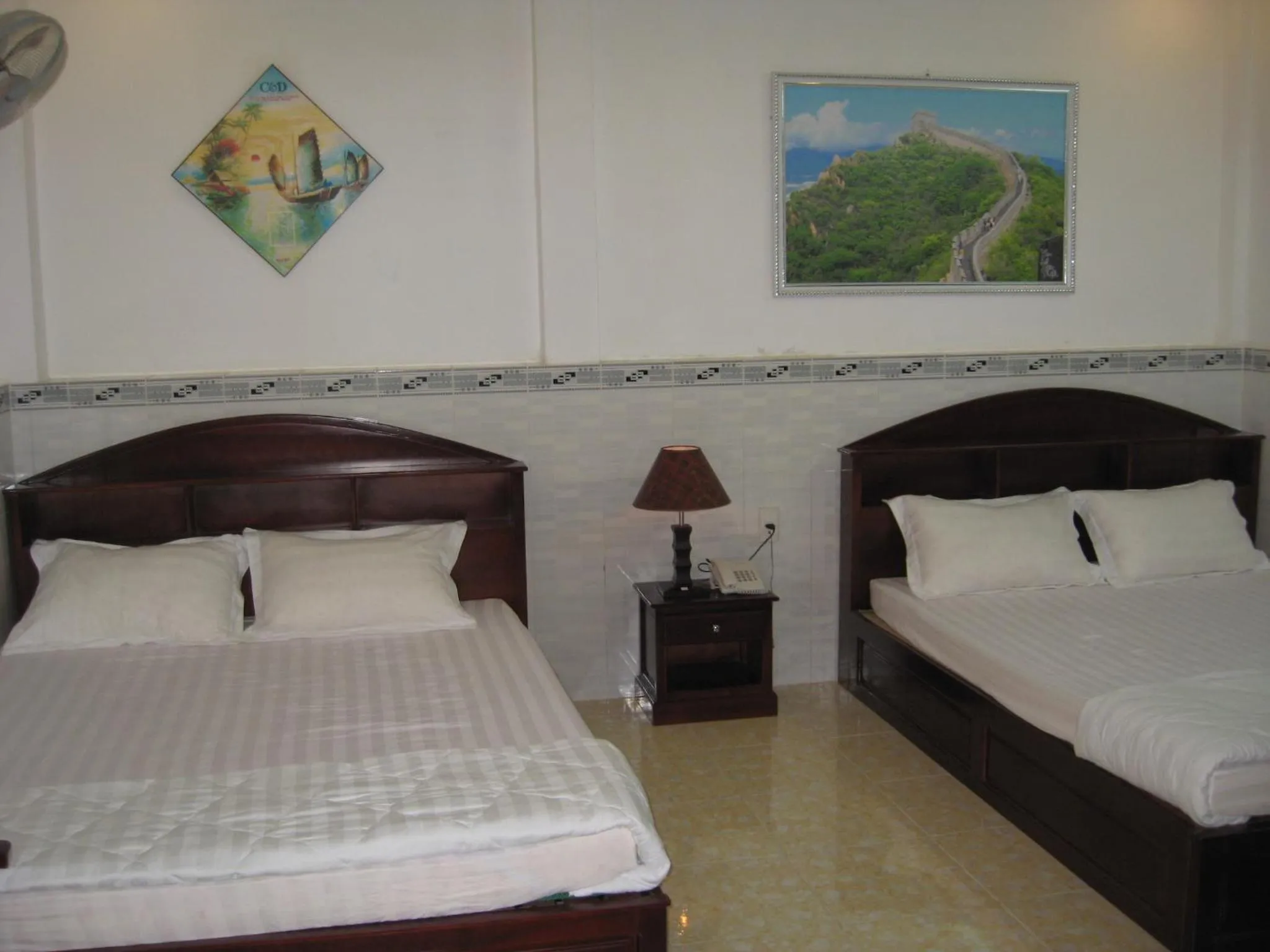 Photo of the whole room, Bed in Huynh Lac Can Tho Hotel