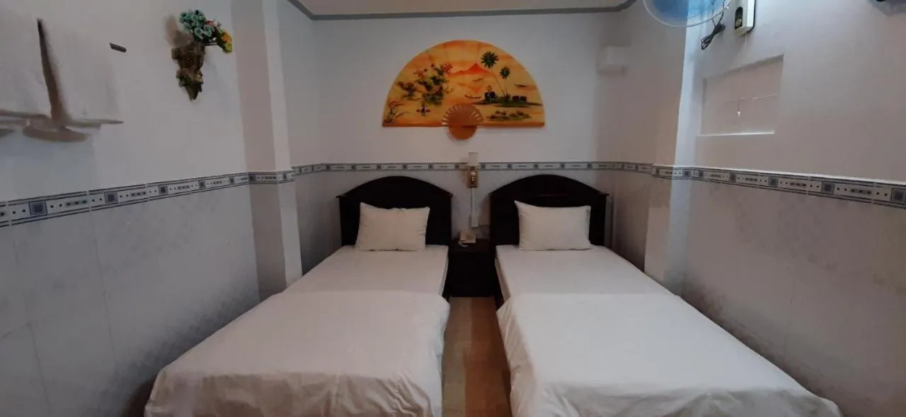 Bed in Huynh Lac Can Tho Hotel