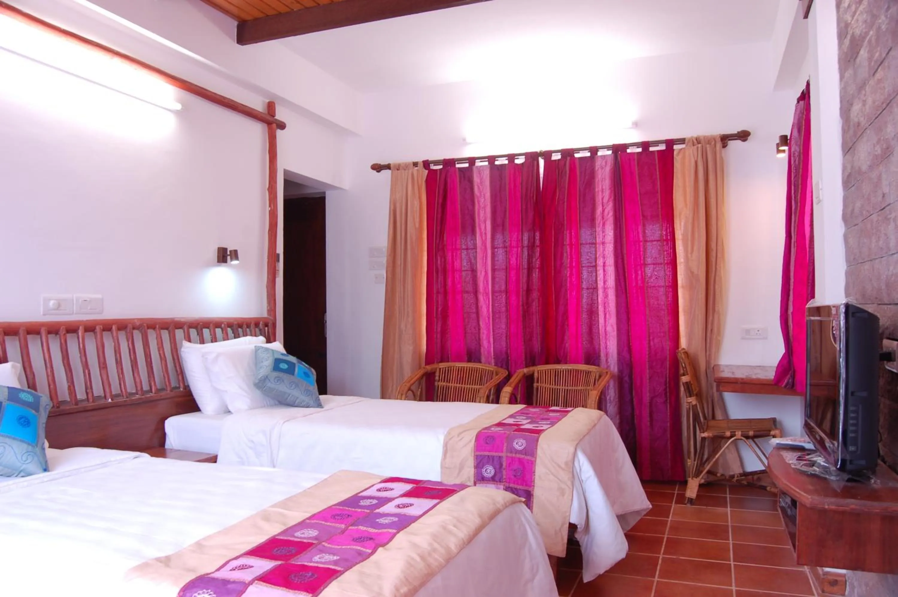 Bedroom, Bed in Kadambavanam Ethnic Village Resort