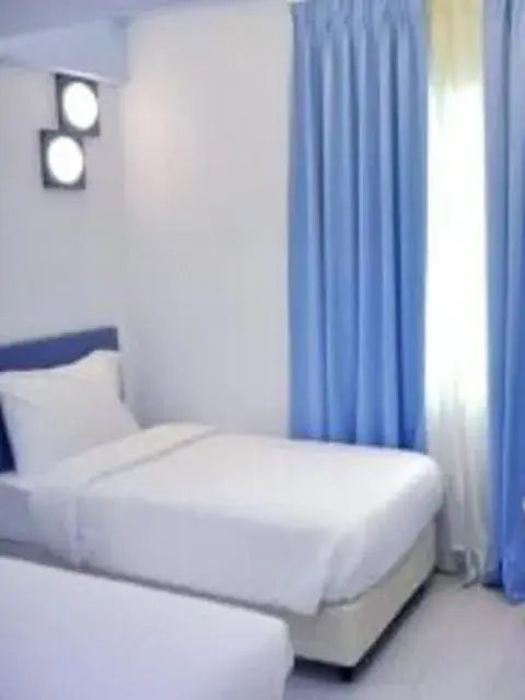 Bed in YY318 Hotel Bukit Bintang Bed in YY318 Hotel Bukit Bintang