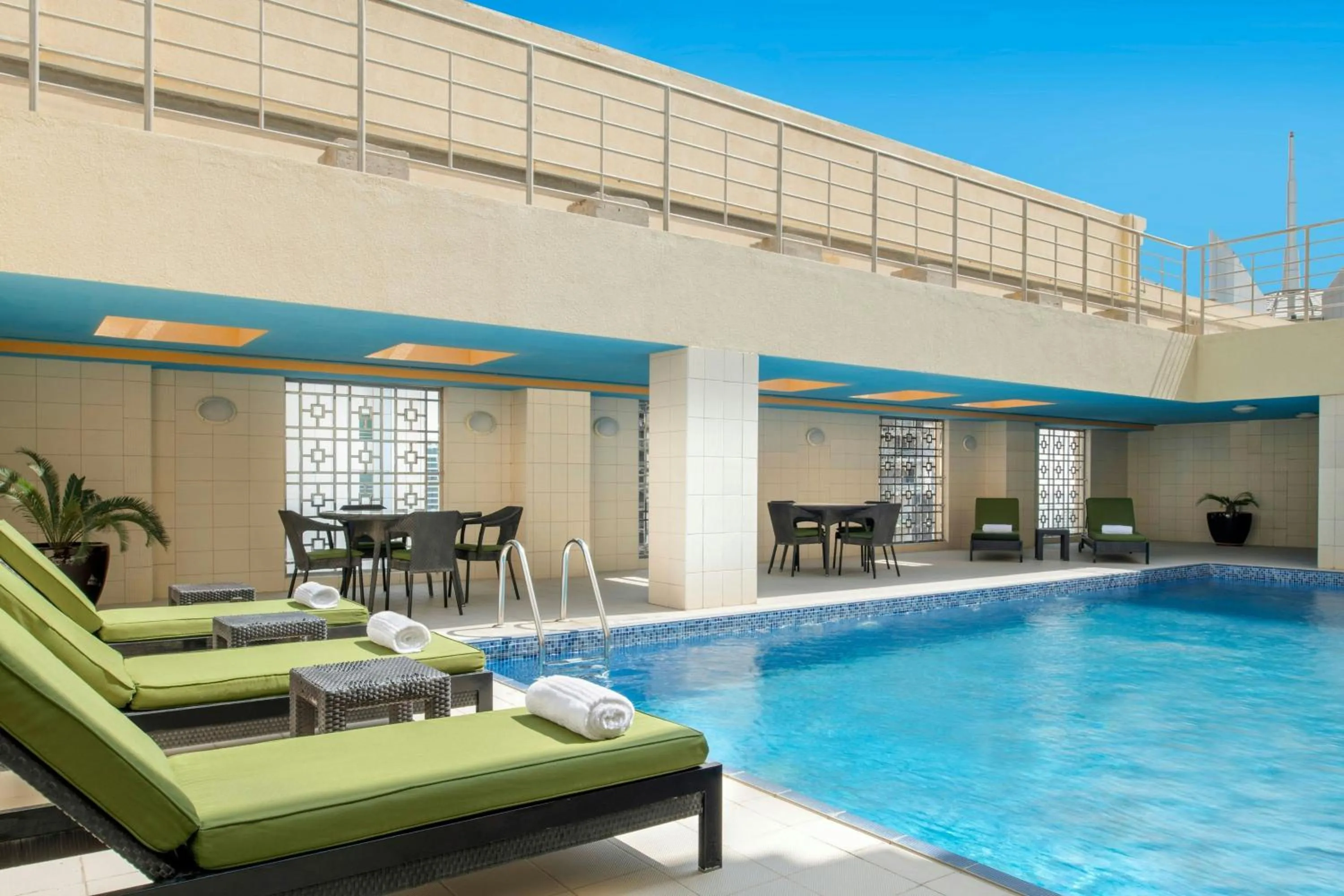 Swimming pool in Marriott Executive Apartments City Center Doha