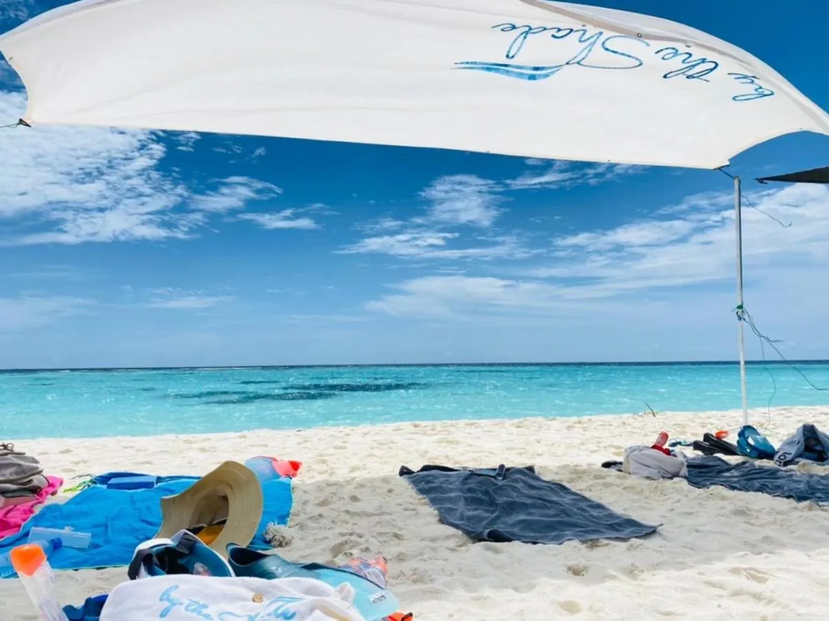 By the shade Maldives