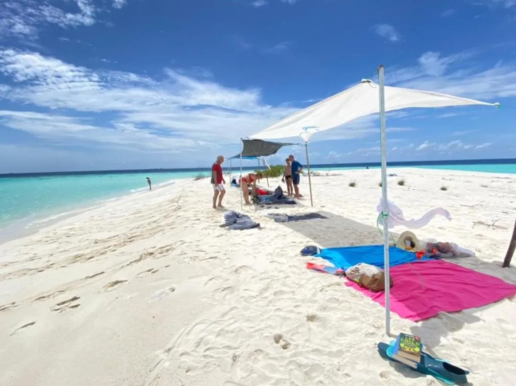 By the shade Maldives