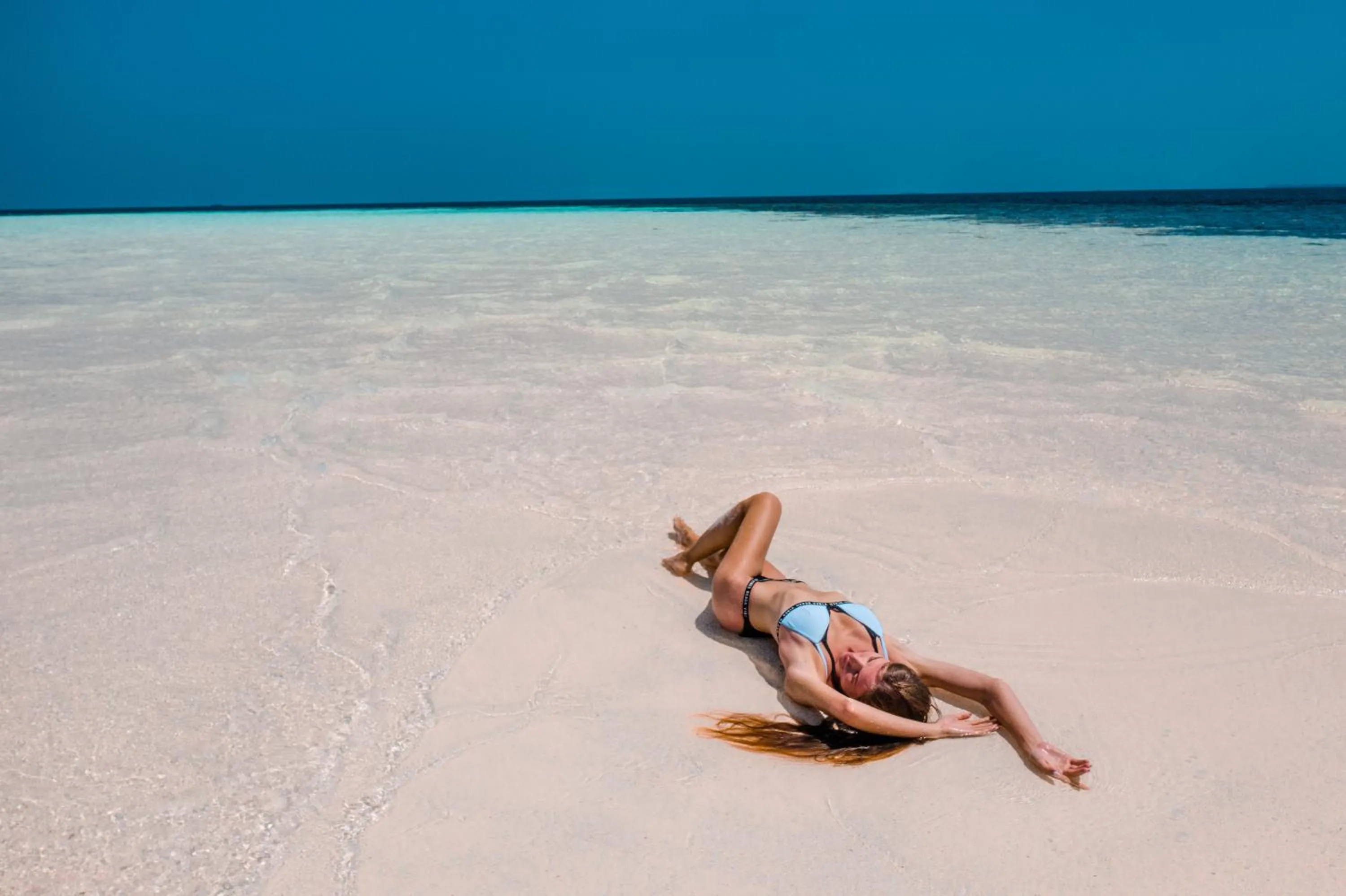 By the shade Maldives