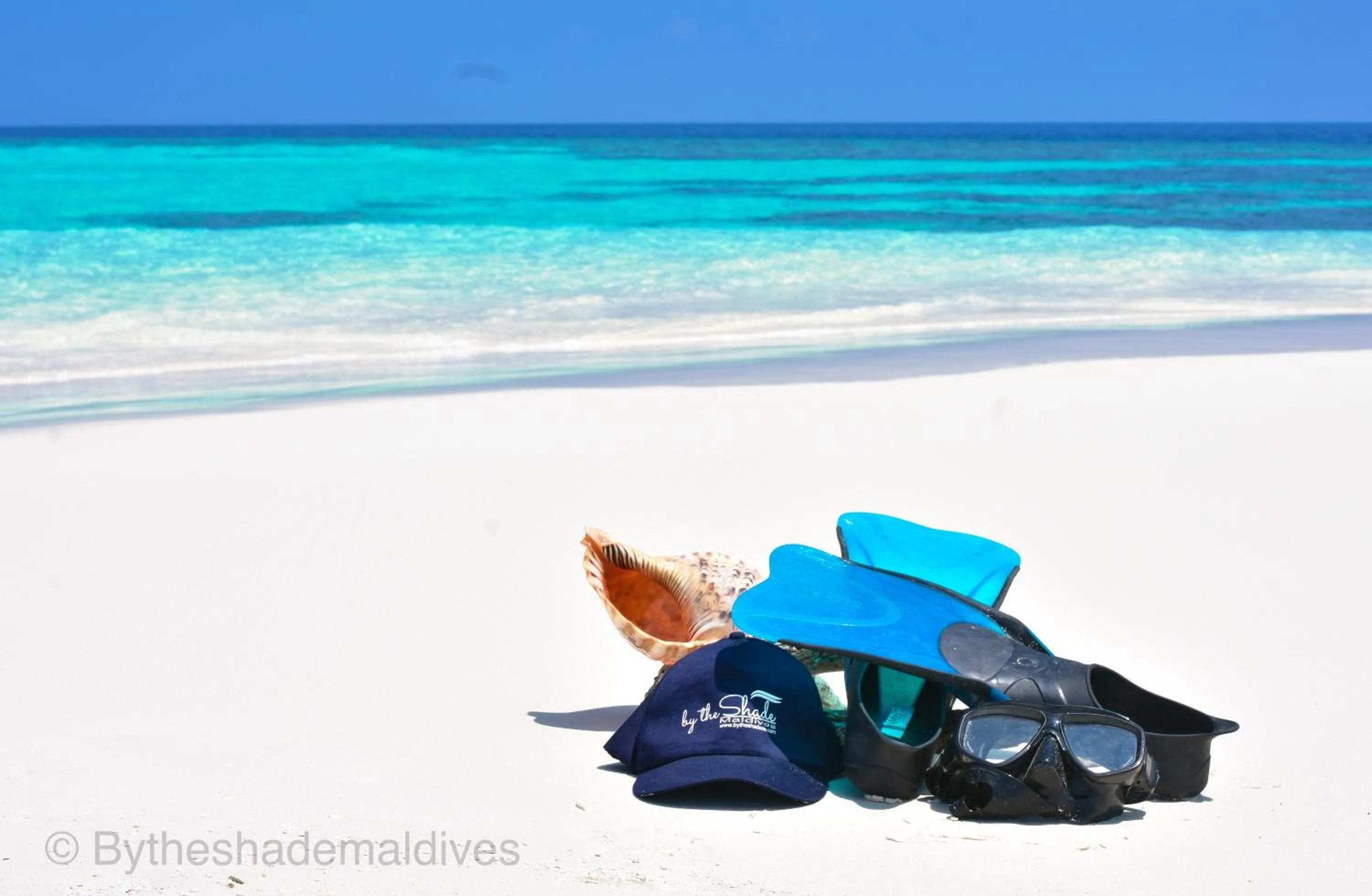 By the shade Maldives