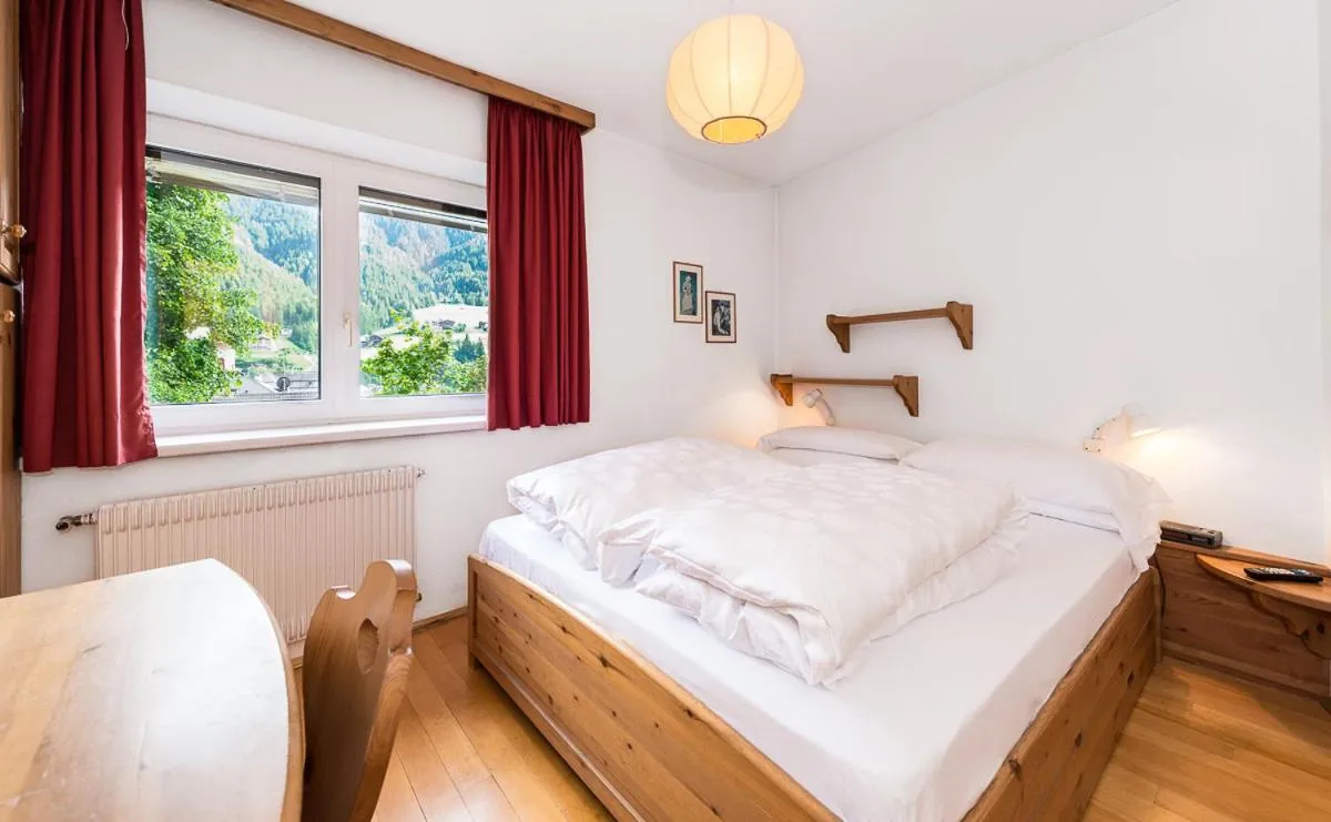 Bed in AppartChalet LA RONDULA - 100m from Seceda