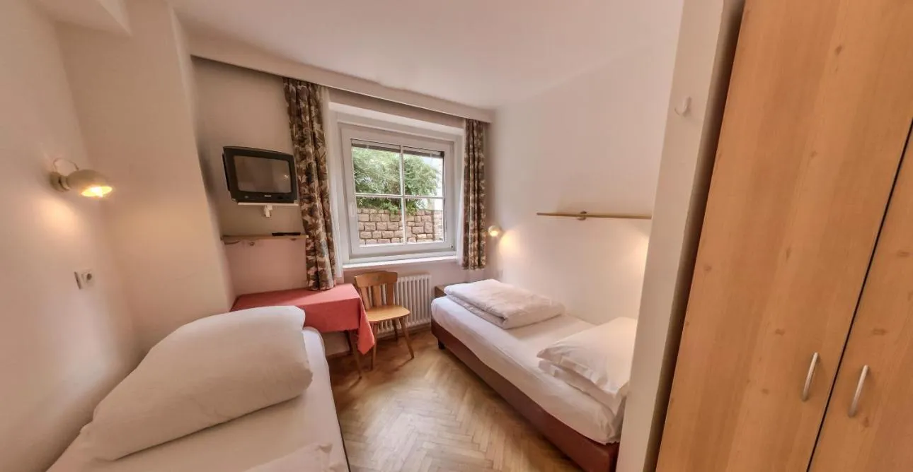 Bed in AppartChalet LA RONDULA - 100m from Seceda