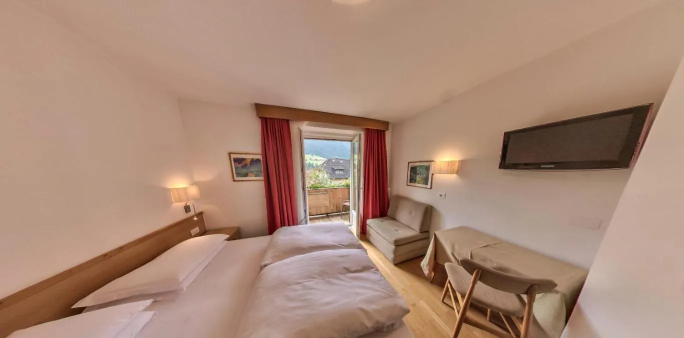 Bed in AppartChalet LA RONDULA - 100m from Seceda