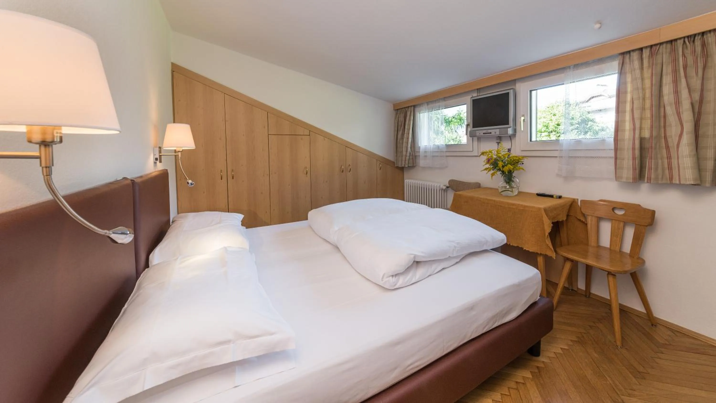 Bed in AppartChalet LA RONDULA - 100m from Seceda