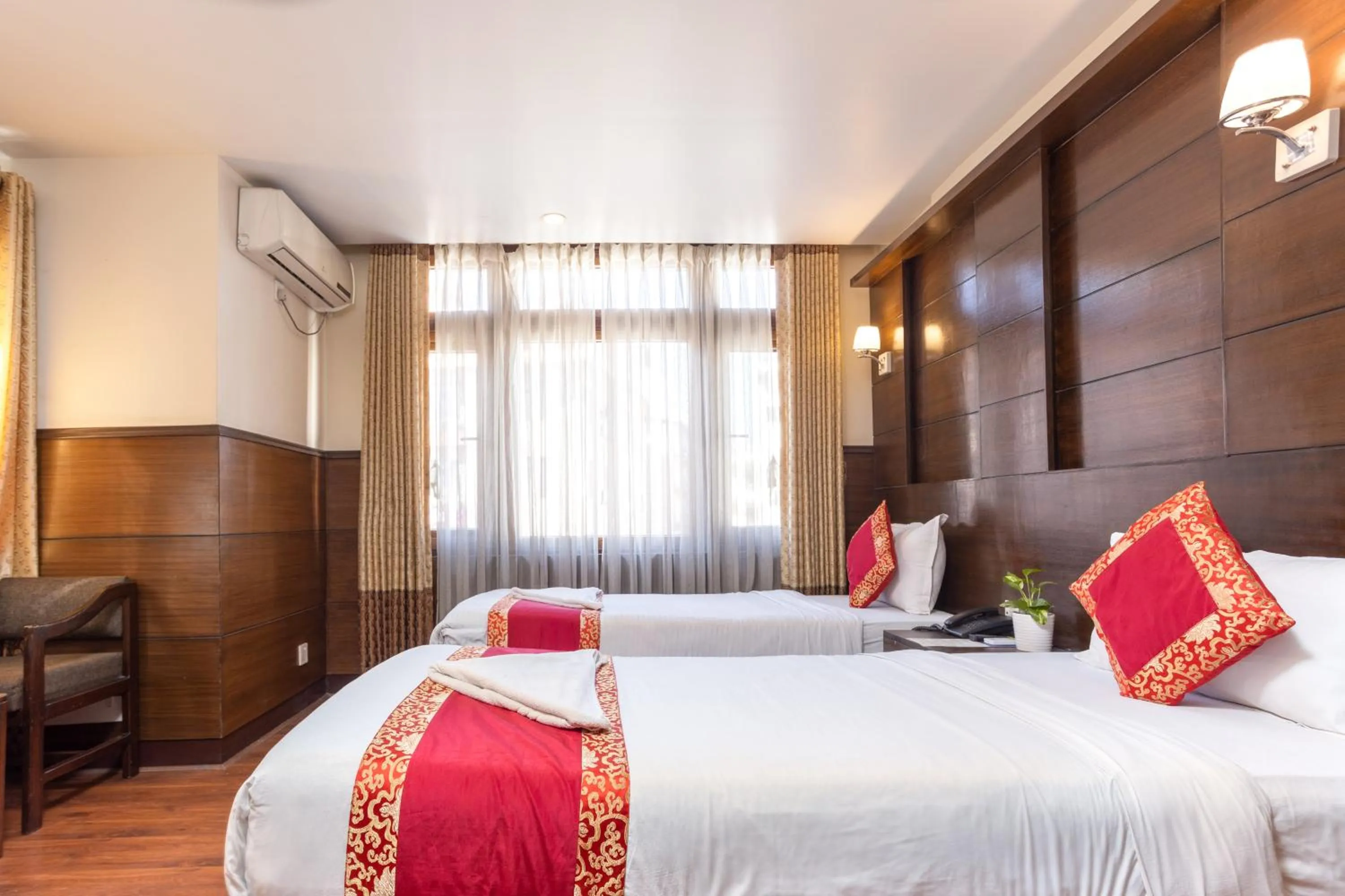 Seating area, Bed in Hotel Buddha