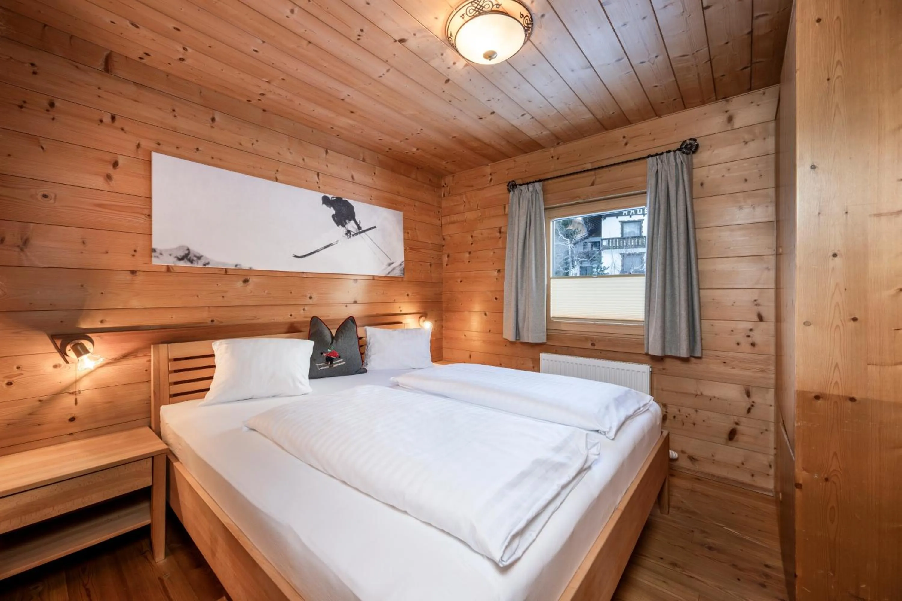 Bed in AUSTRIA APPART - natural Lifestyle Appartements auf der Piste