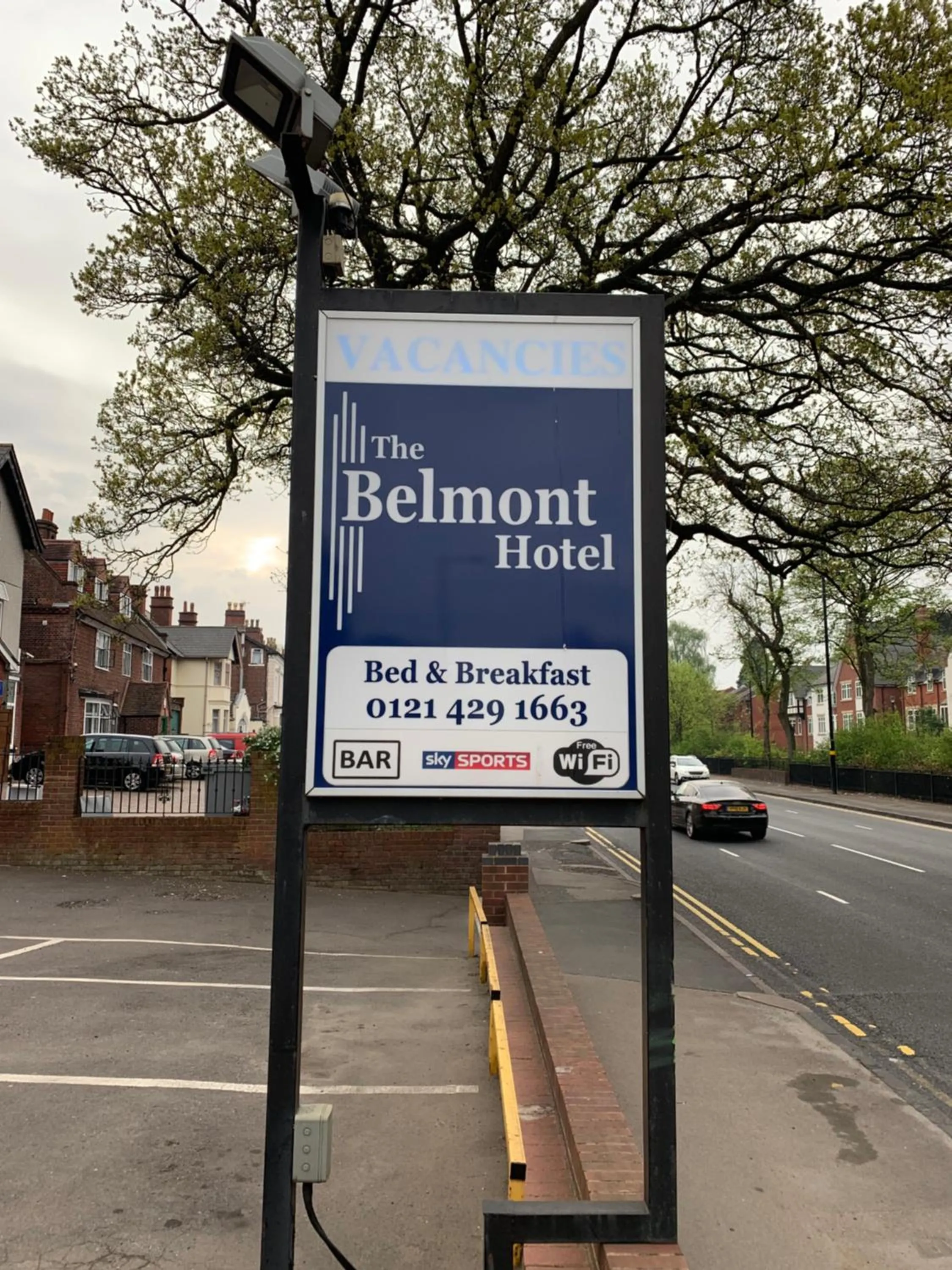 Property logo or sign in Belmont Hotel