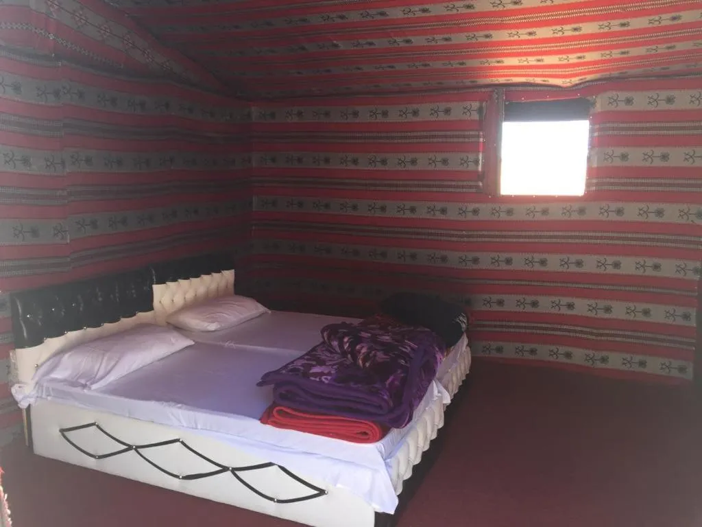 Bed in WADI RUM-Bedouin Tents and Jeep Tours