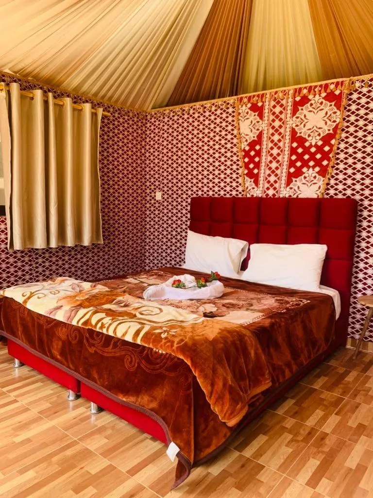 Bed in WADI RUM-Bedouin Tents and Jeep Tours
