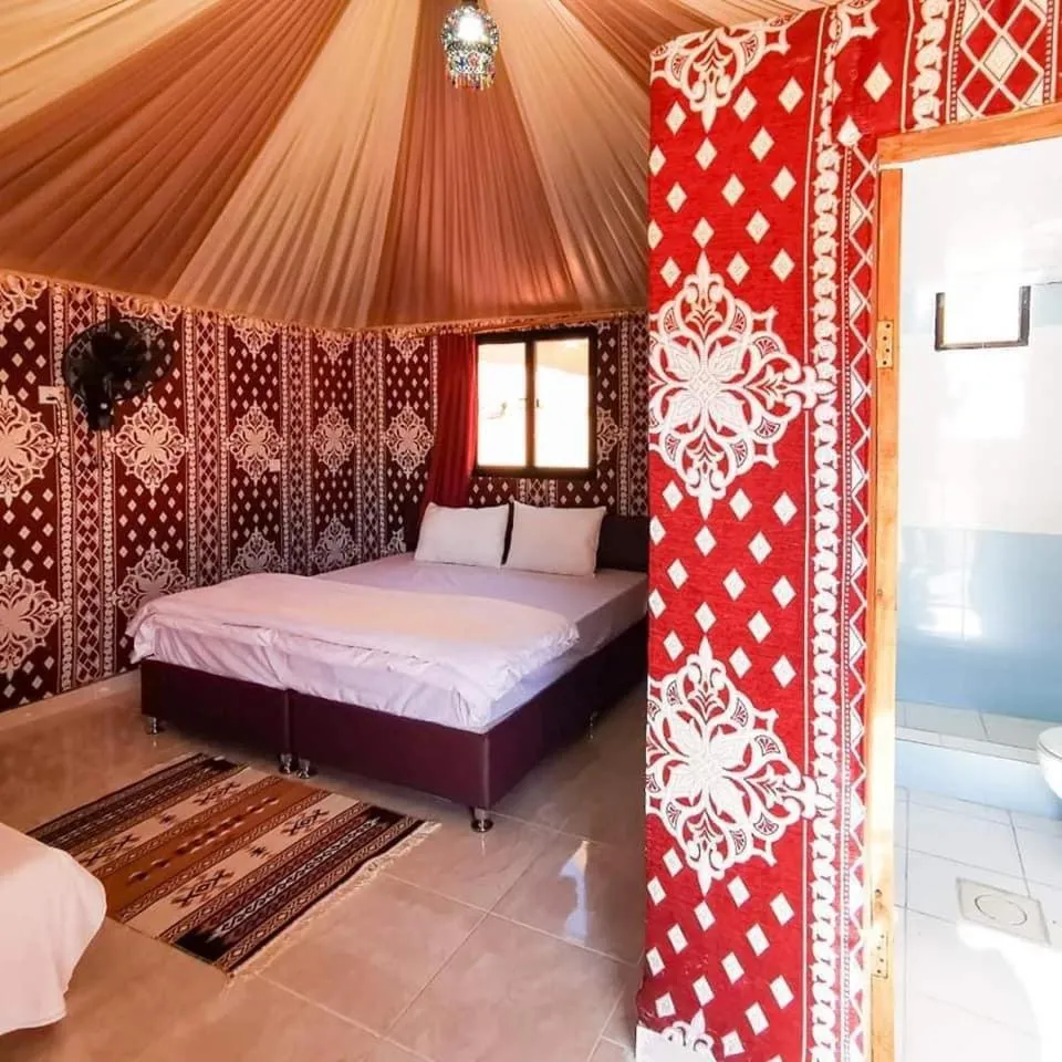 Bed in WADI RUM-Bedouin Tents and Jeep Tours