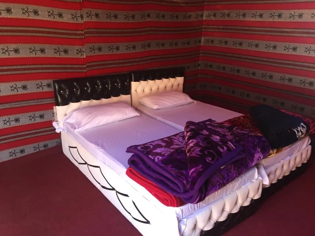 Bed in WADI RUM-Bedouin Tents and Jeep Tours