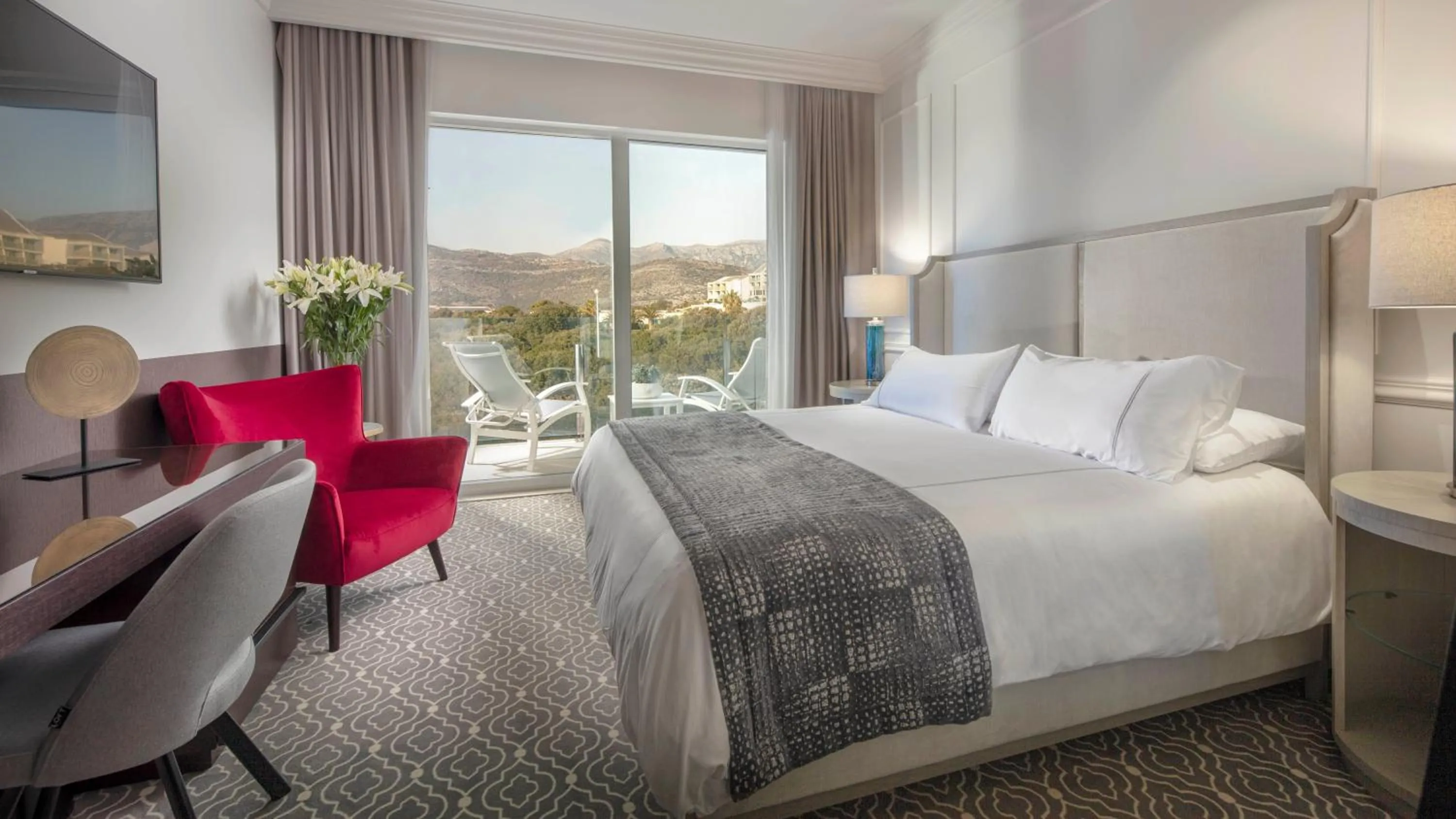 Bed in Royal Palm Hotel