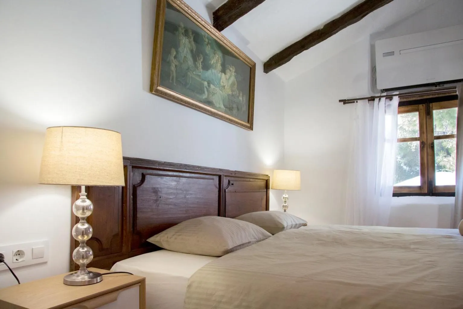 Bed in Boutique Hotel Rancho Los Lobos