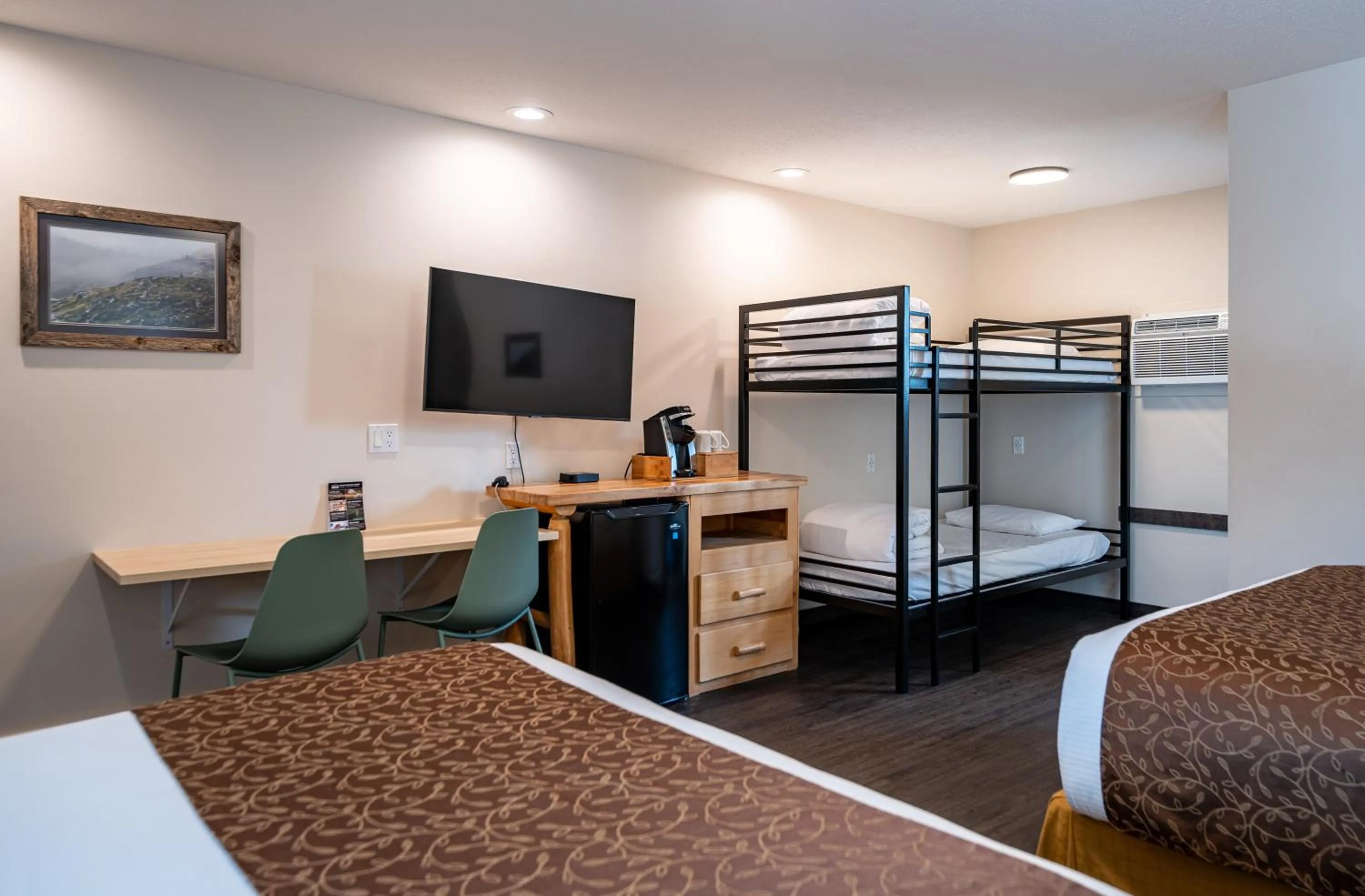 Bed in Swiss Chalet Motel