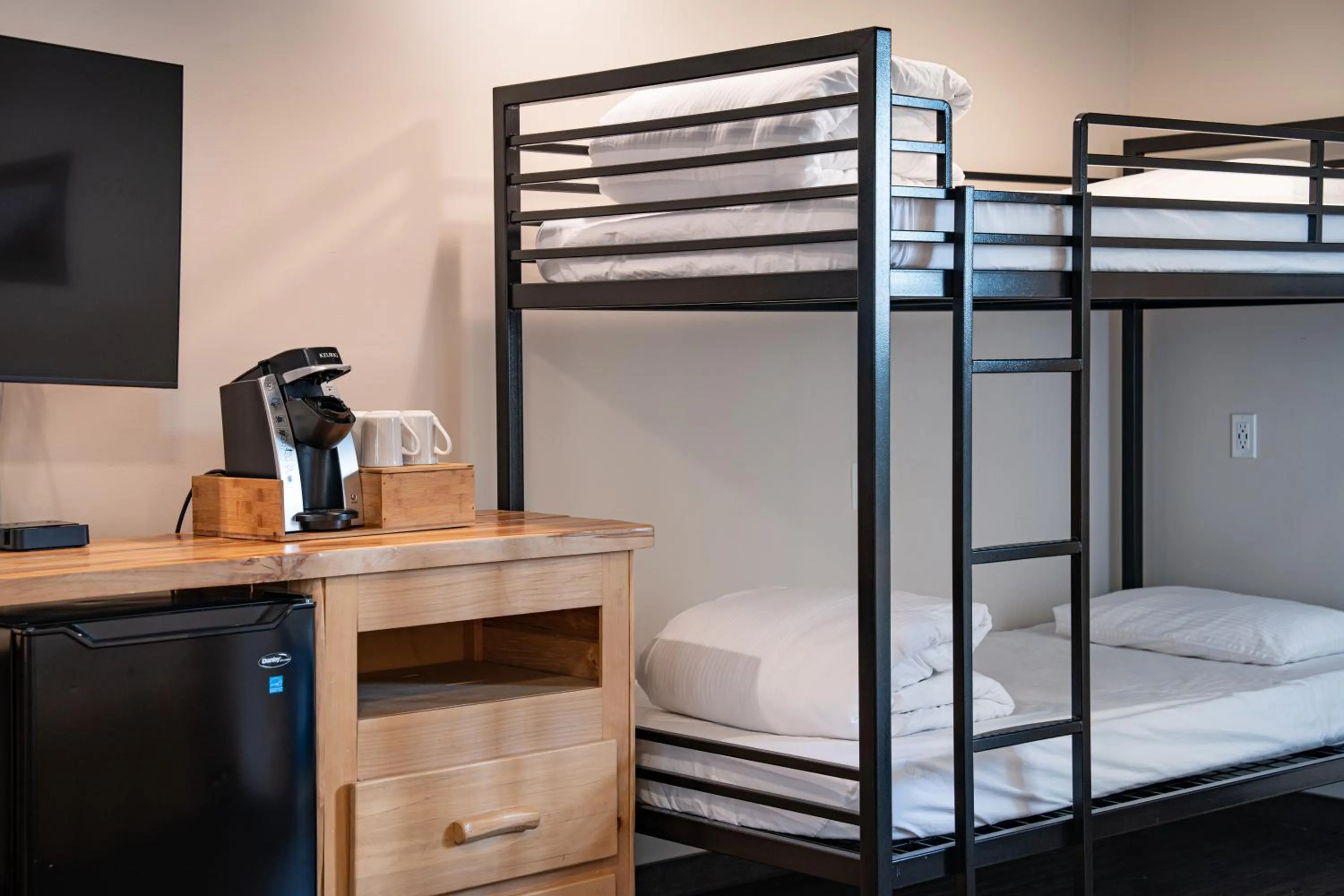 Bed in Swiss Chalet Motel