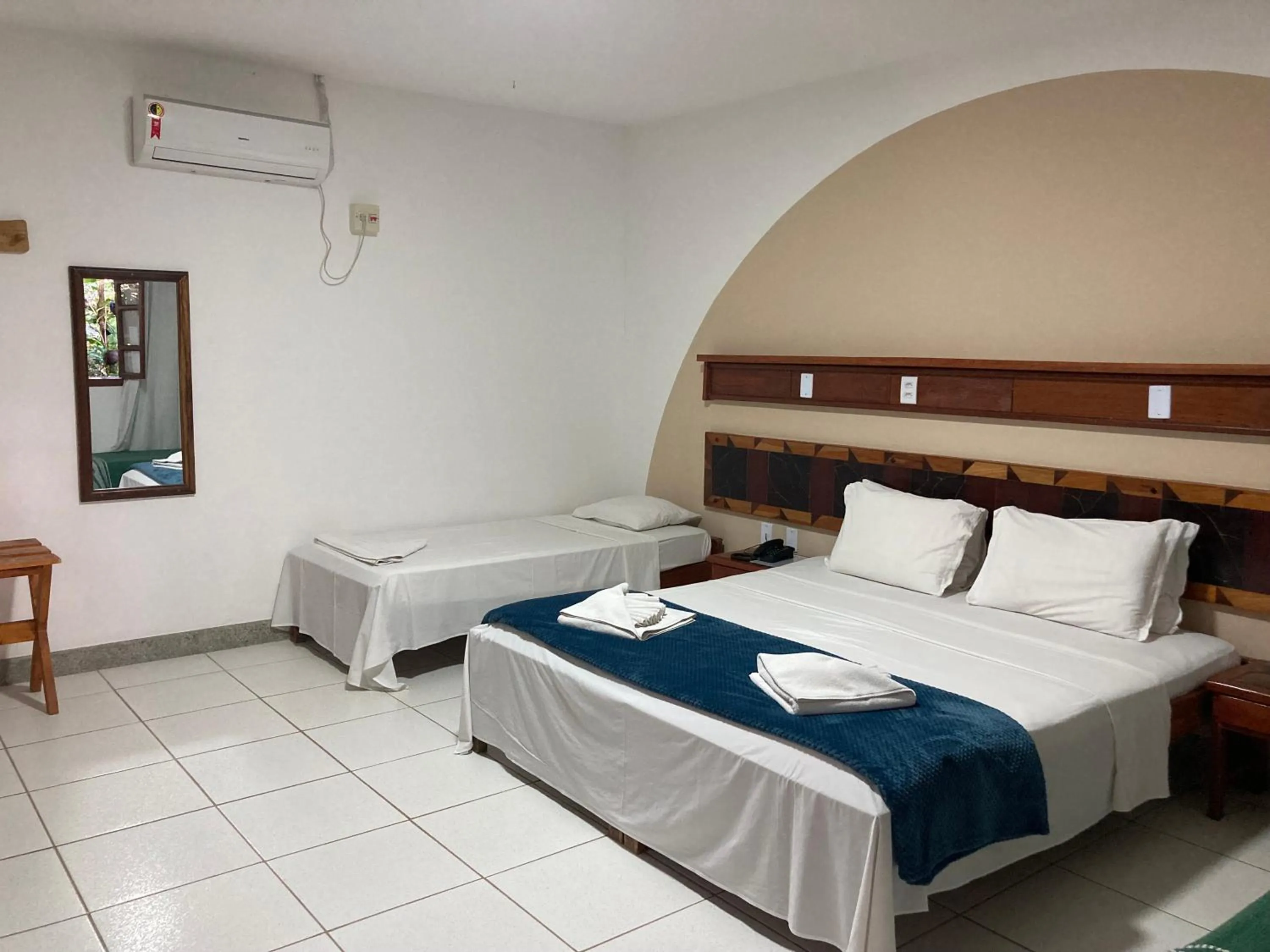 Bed in Pousada Pau Brasil Ubu