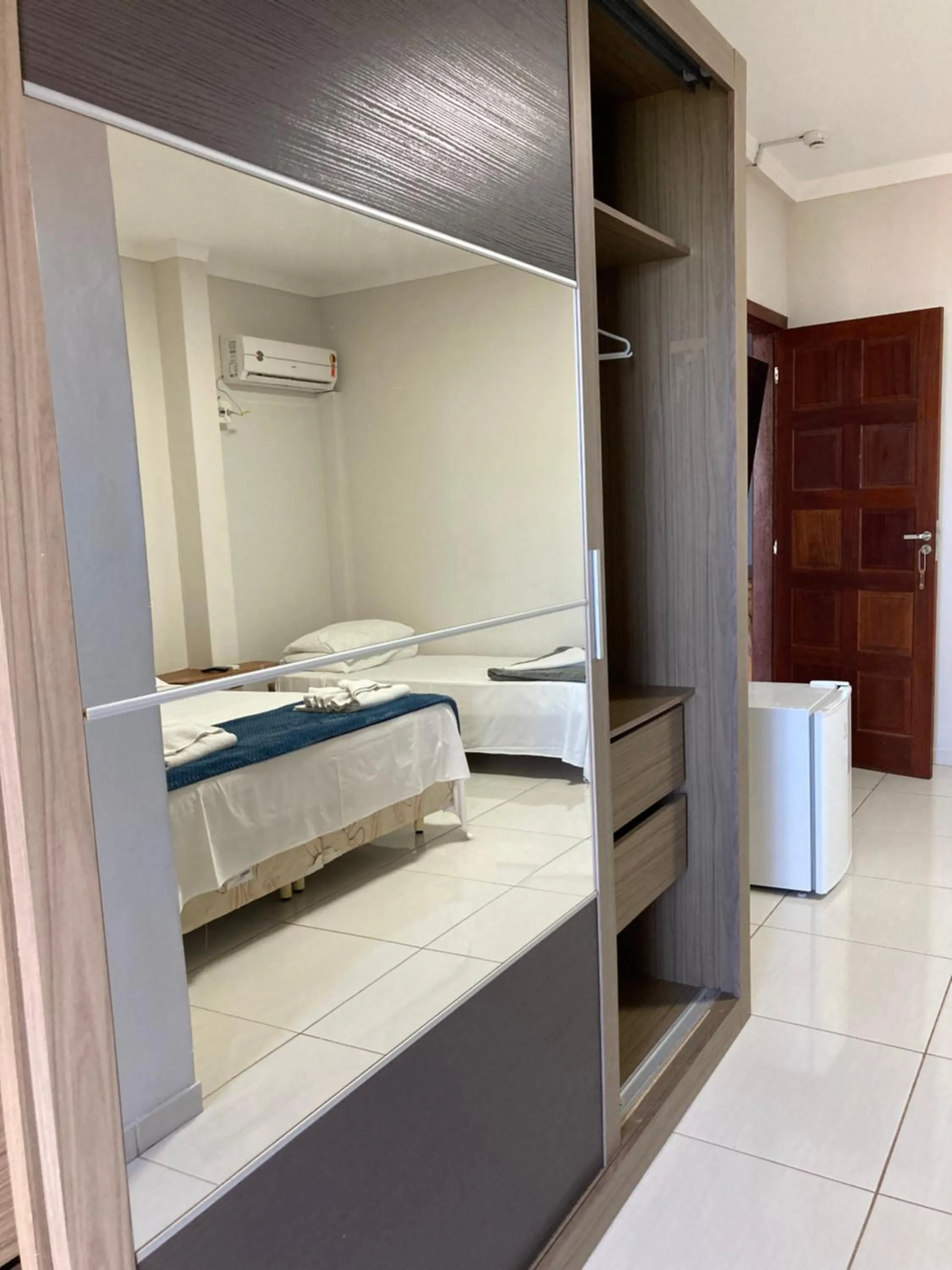 Bed in Pousada Pau Brasil Ubu