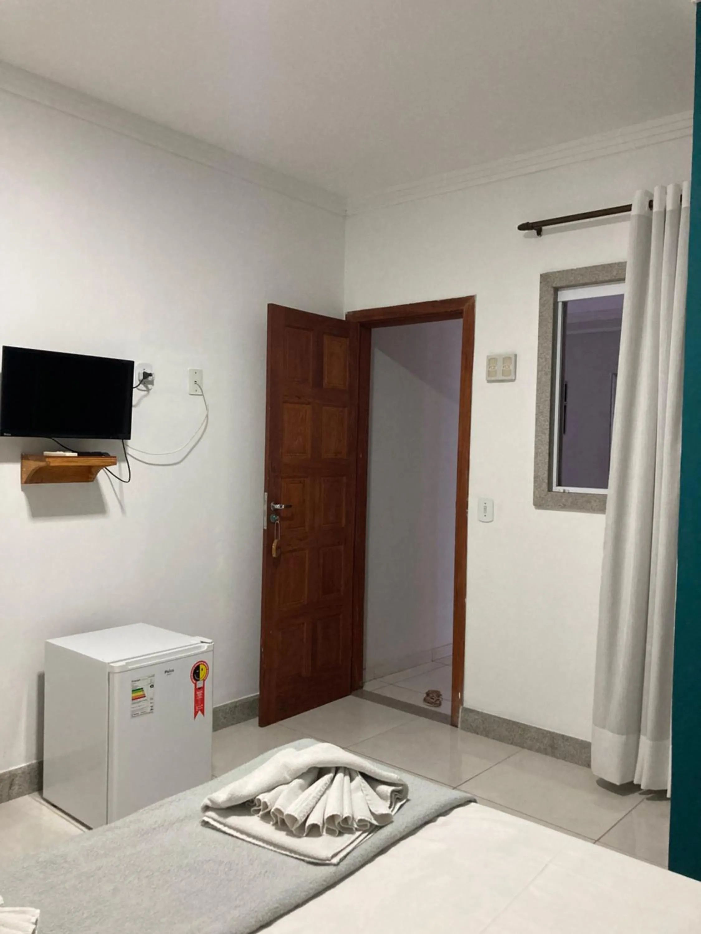 Bed in Pousada Pau Brasil Ubu