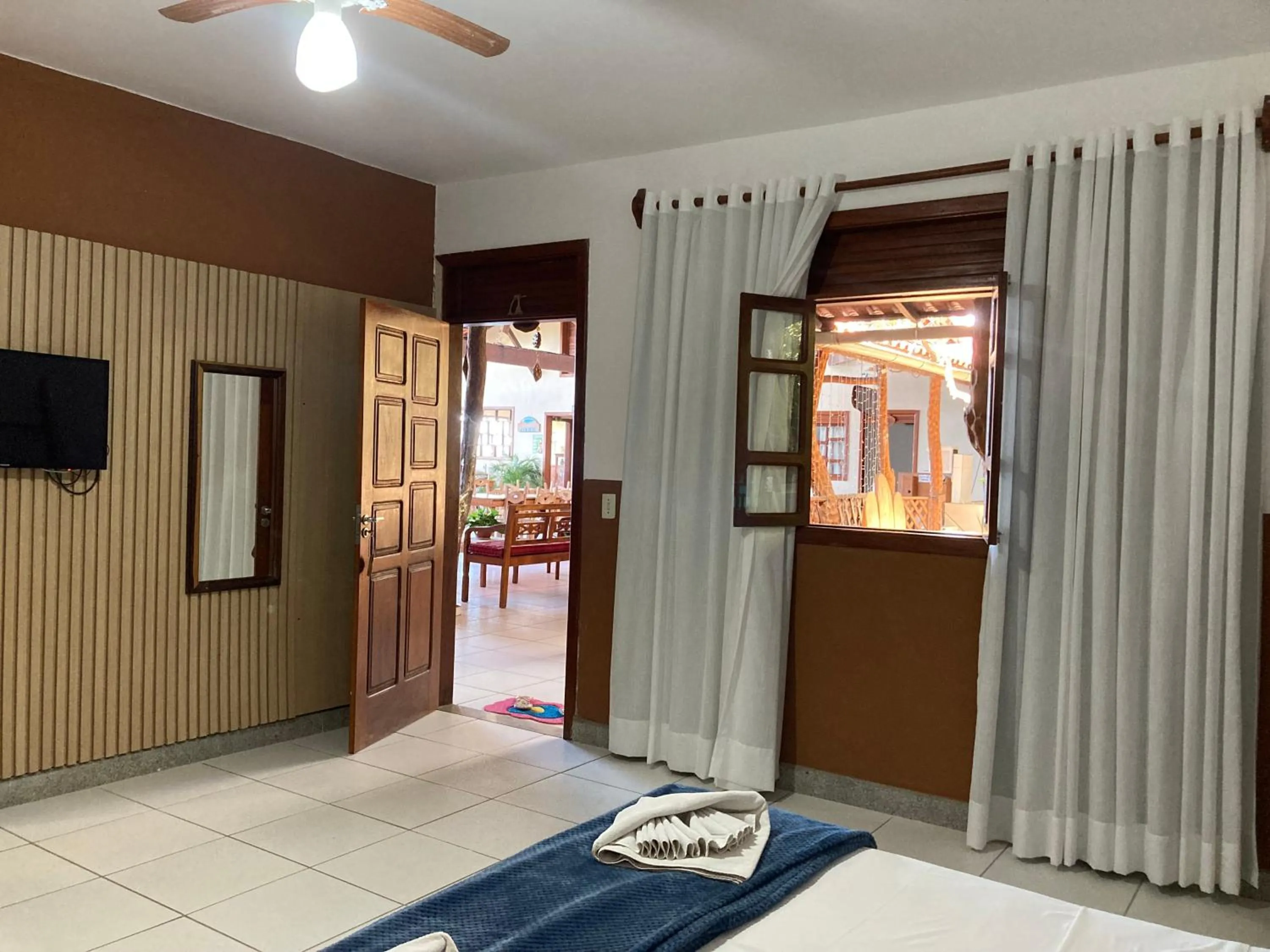 Bed in Pousada Pau Brasil Ubu