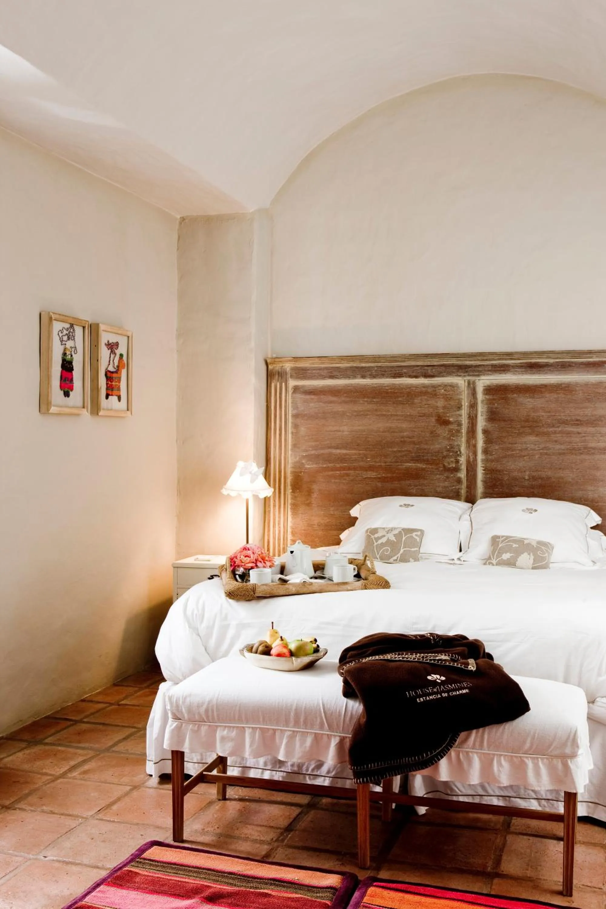 Bed in House of Jasmines Relais & Châteaux